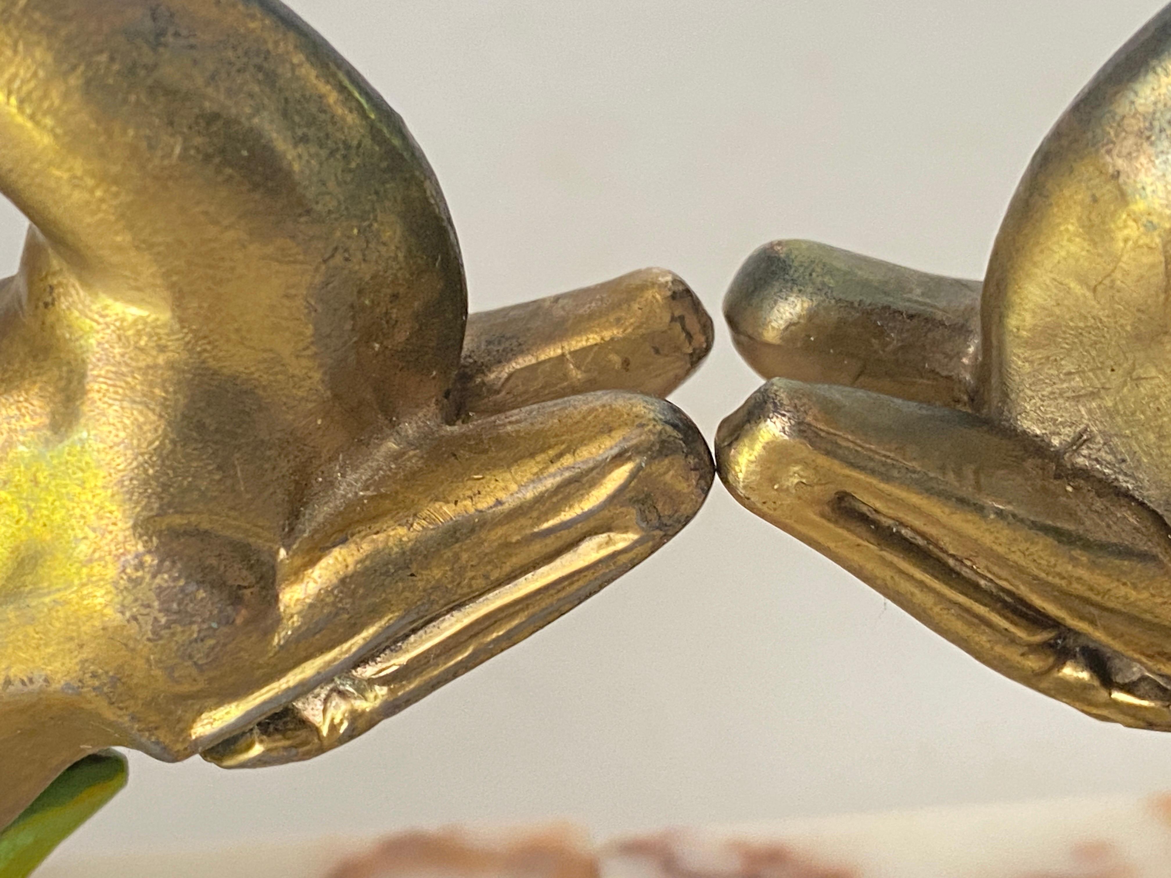 Pair of book ends representing Antelopes . The objects are in Marble and Brass. These bookends were made in France in the 1940s, they are typical objects from the Art Deco period. 