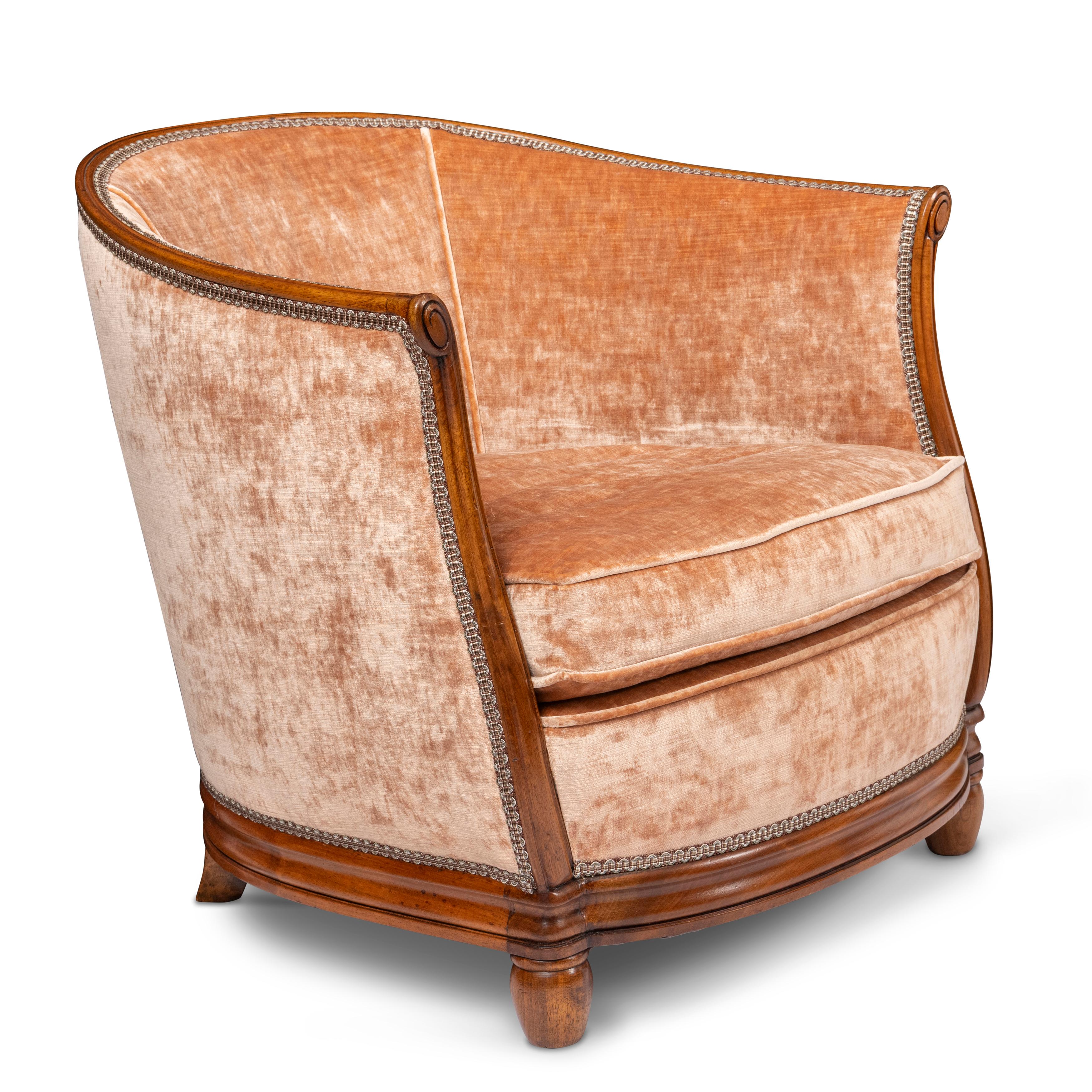 Pair of Beechwood Art Deco Arm Chairs, France circa 1930
Attributed to Paul Follot ( 1877-1941 ).
Semi-circular form with scrolling uprights and truncated acorn feet.

Heals of London sold fashionable designs from abroad.
Paul Follot designed for