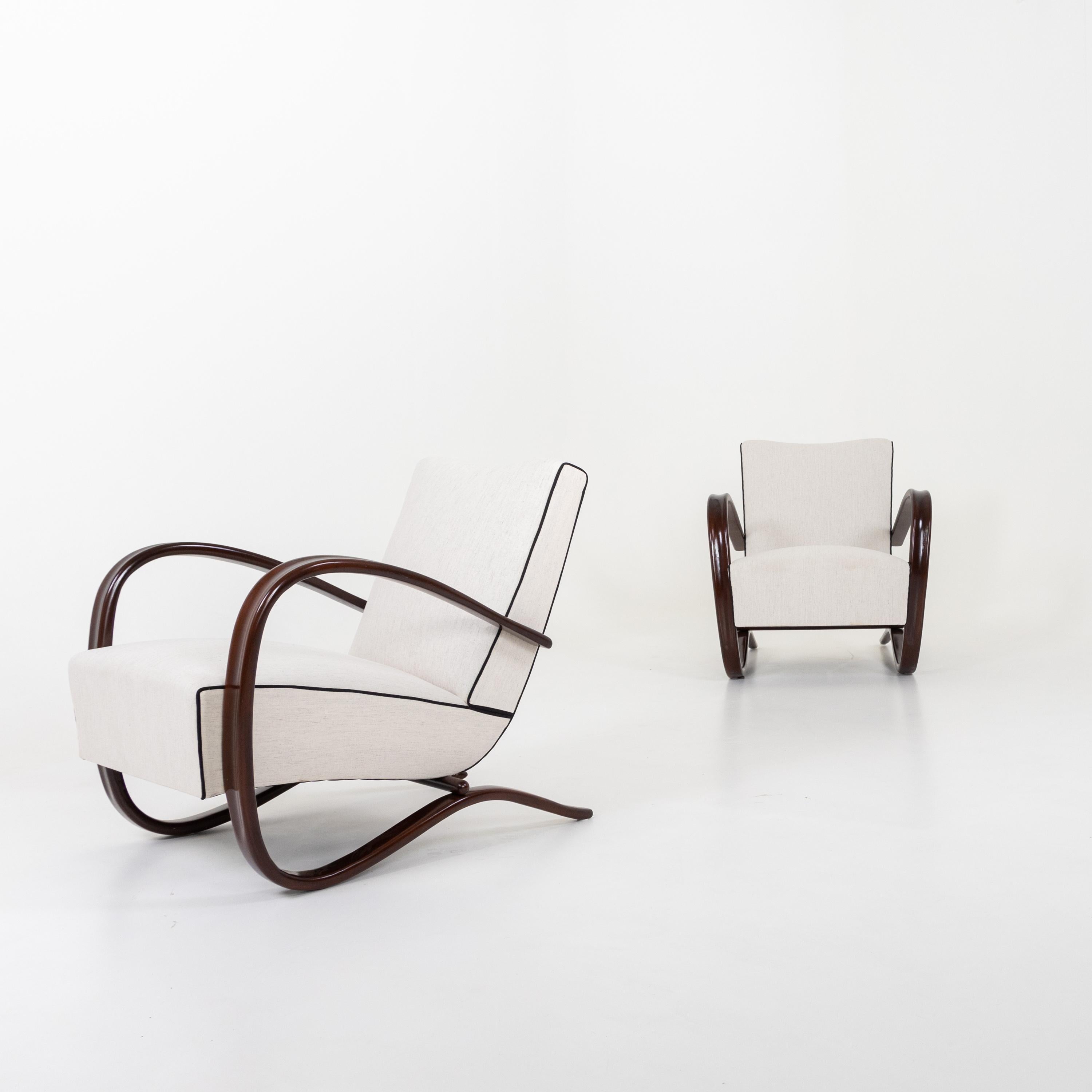 Pair of Art Deco armchairs by Jindrich Halabala.
Stained beechwood.