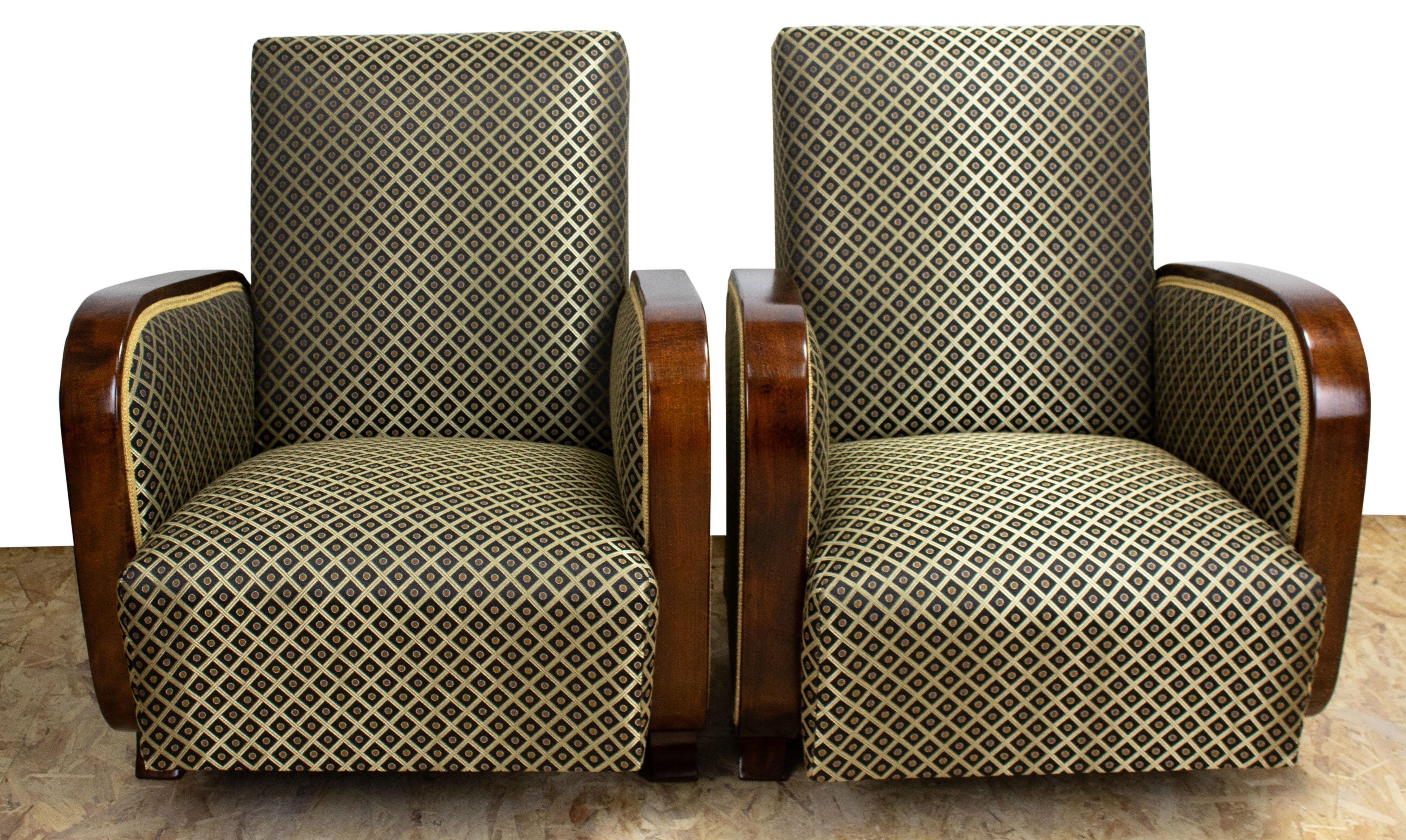 The armchairs were custom manufactured for the office of one Austrian bank director. Exclusive fabrics werte used. The wooden parts and upholstery were restored, using period manufacturing techniques. The armchairs provide a very comfortable seating.