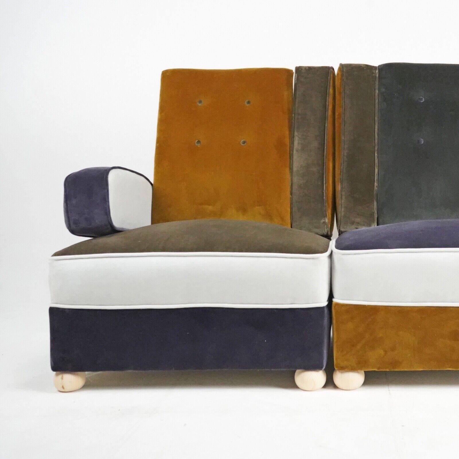 Ces fauteuils modulaires audacieux de style Art déco font sensation. Dotée d'un revêtement en velours patchwork unique, cette paire de fauteuils apportera une véritable touche de couleur à votre espace. Ils sont extrêmement confortables et faciles à