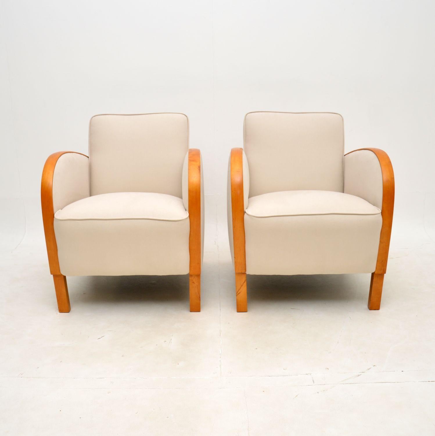 A stylish and very well made pair of Art Deco armchairs in satin birch. They were recently imported from Sweden, they date from the 1930’s.

The quality is excellent, they are well sprung and very comfortable. The sweeping satin birch arms curve