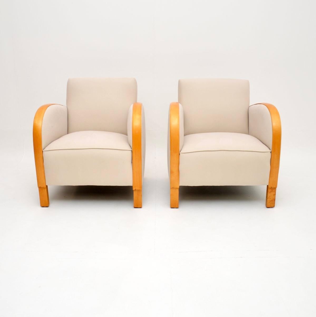 A stylish and very well made pair of Art Deco armchairs in satin birch. They were recently imported from Sweden, they date from the 1930’s.

The quality is excellent, they are well sprung and very comfortable. The sweeping satin birch arms curve