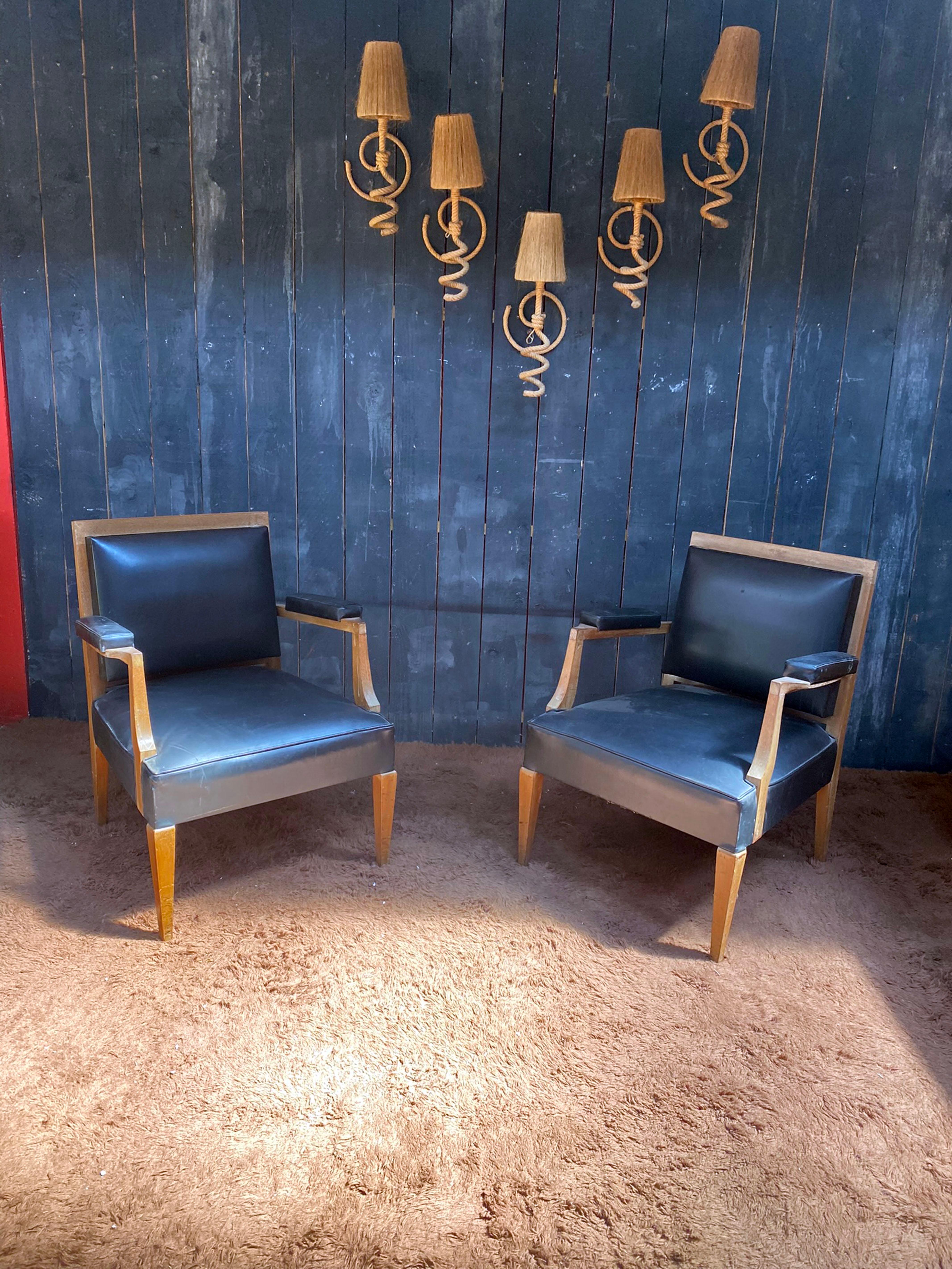 Pair of Art Deco armchairs in walnut in the style of
Andre Arbus
around 1940
patina to see again
faux leather in good condition
1 third armchair is also available.