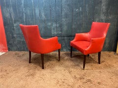 Pair of Art Deco armchairs upholstered in red leather, circa 1930/1940