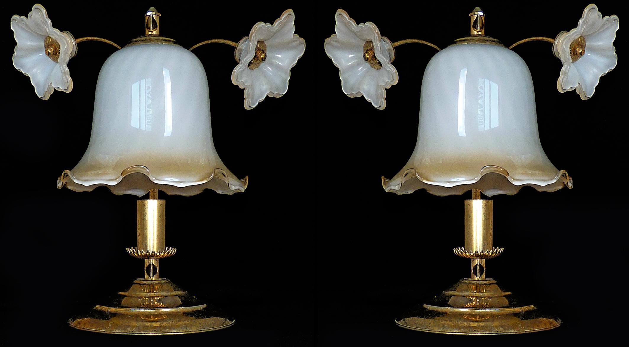 Adorable pair of Art Deco and Art Nouveau amber glass flowers gilt table lamps, circa 1930
Measures:
Diameter 9 in/ 22 cm
Height 15 in/ 30 cm
Weight 6.6 lb/ 3 kg
One-light bulb each - E14 / good working condition / European wiring.
Beautiful