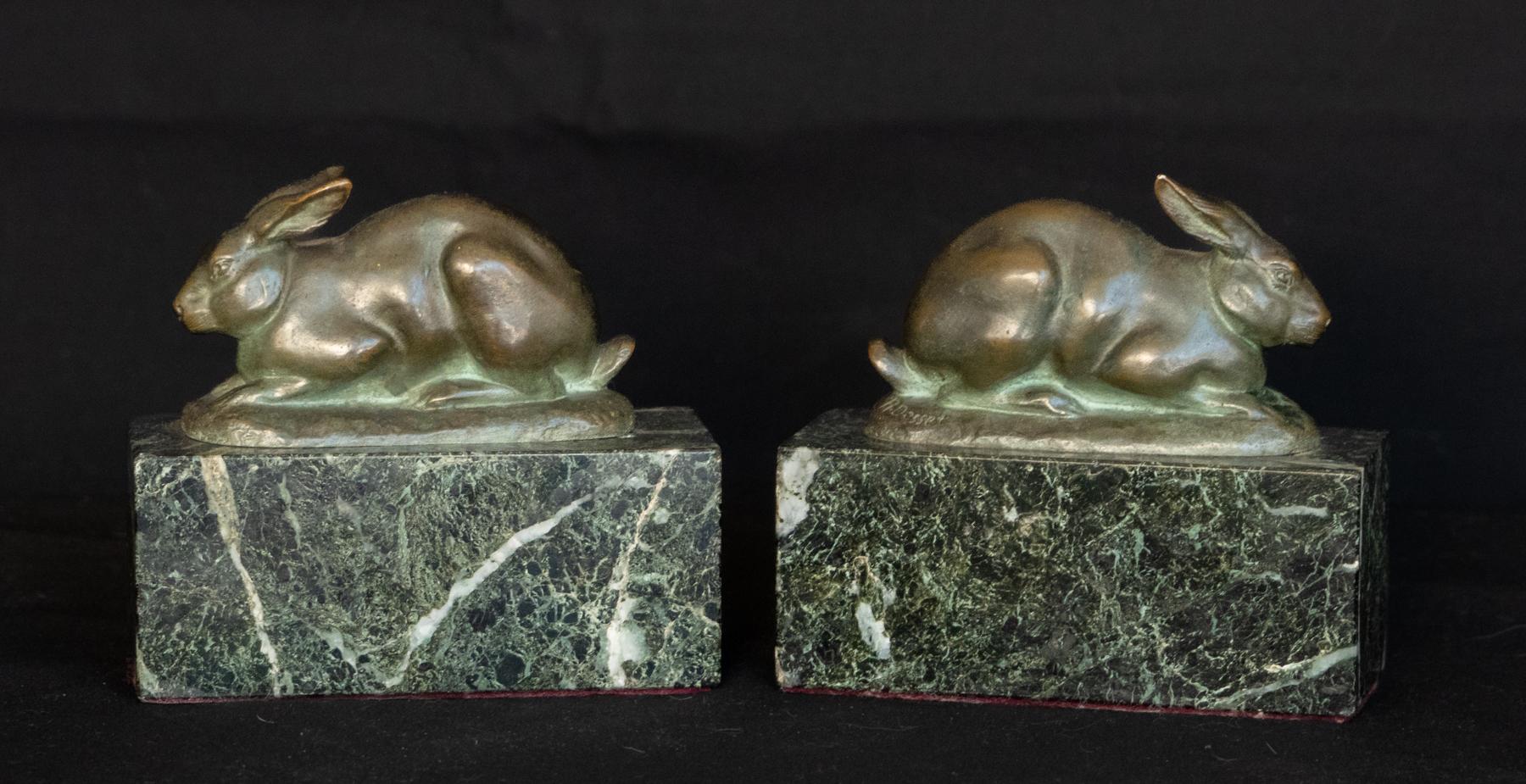 Pair of Art Deco Austrian Bronze Rabbits Signed R. Desset
Each rabbit mounted on a block of variegated green serpentine marble.
Rabbits are each modeled in a different pose. The natural green verdigris bronze complimenting the serpentine bases.