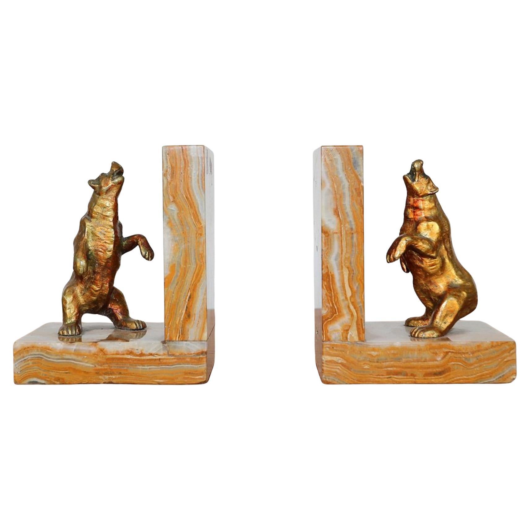 Pair of Art Deco bear bookends in marble and brass, France 1930s