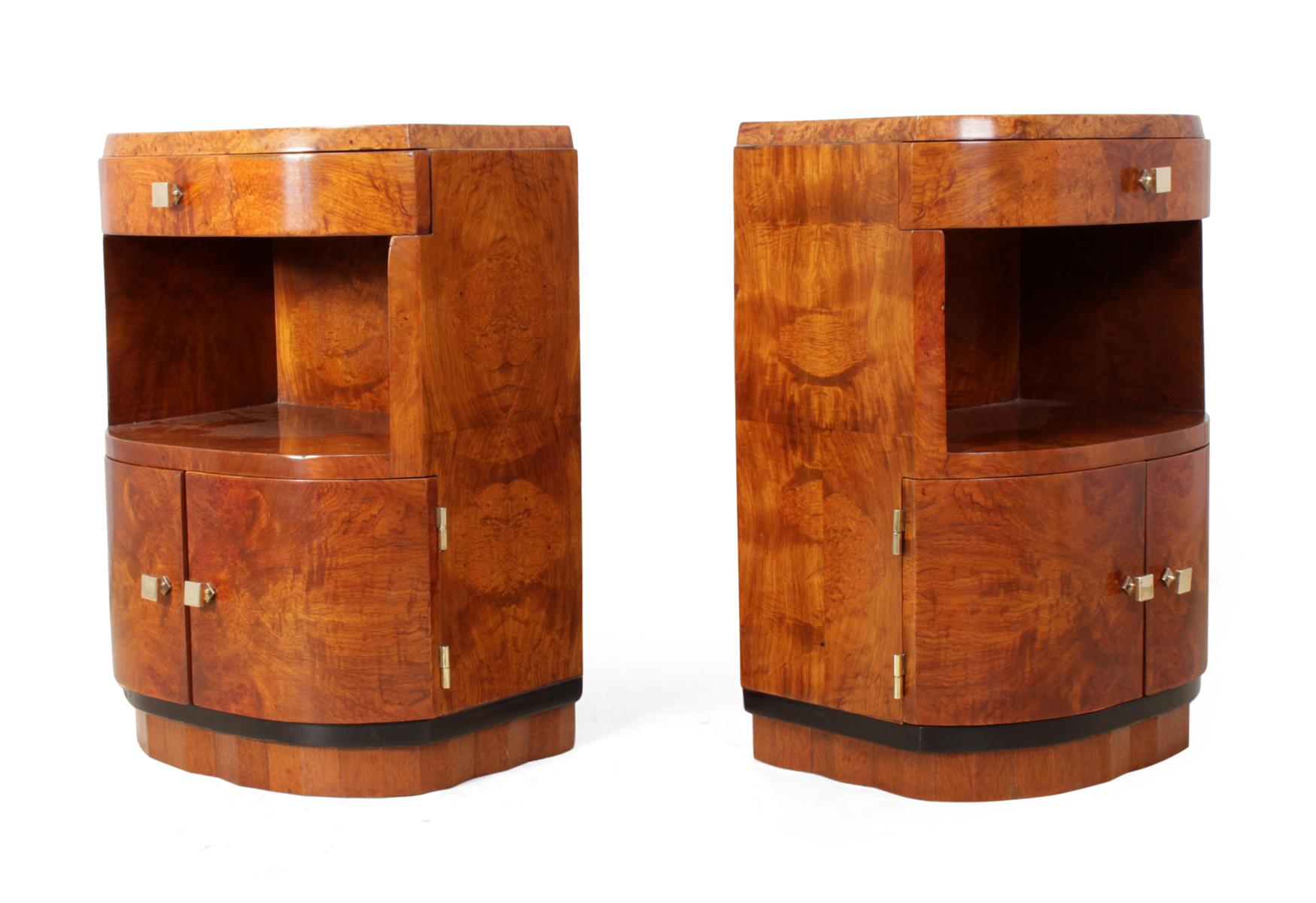 Pair of Art Deco bedside cabinets
A pair of Amboyna Art Deco bedside cabinets with single drawer, shelf and double doors below with polished bronze fittings, the cabinets are been fully re polished and are in excellent condition throughout

Age: