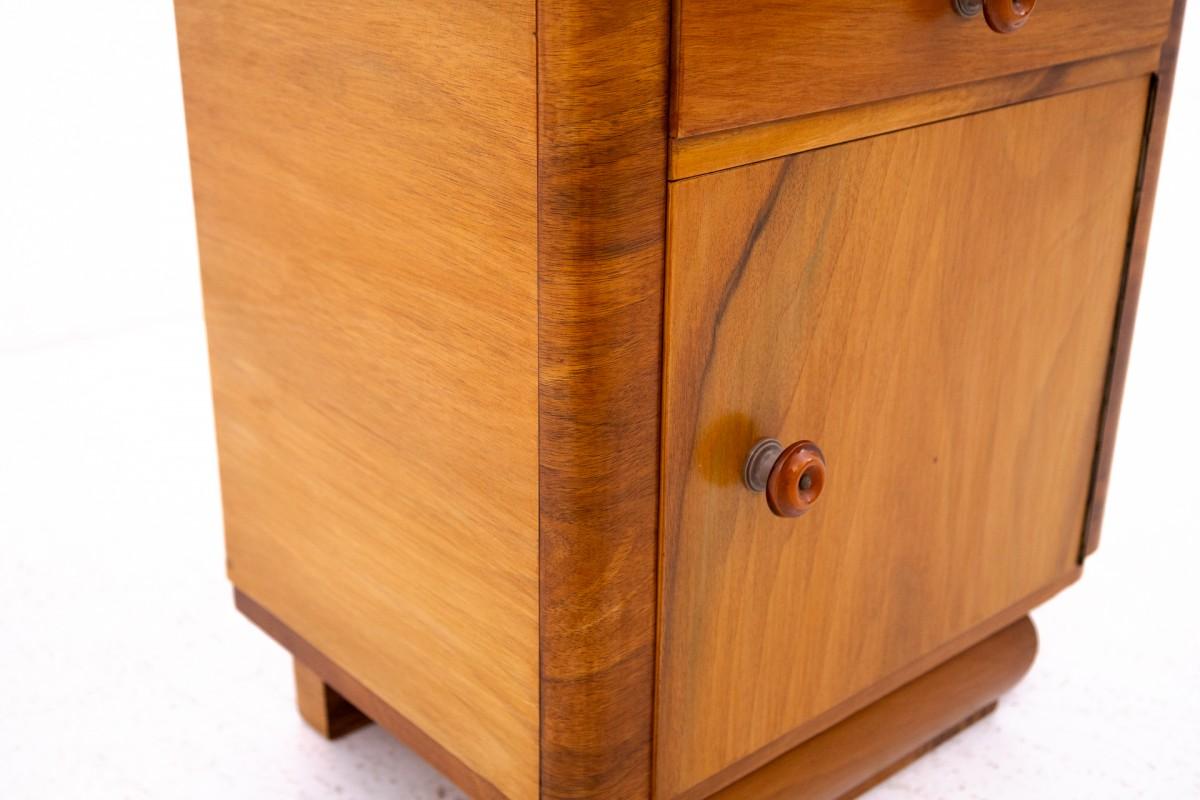Art Deco bedside tables from the 1950s, Poland.

Furniture in very good condition, after professional renovation.

Dimensions: height 53 cm / width 48 cm / depth 35 cm