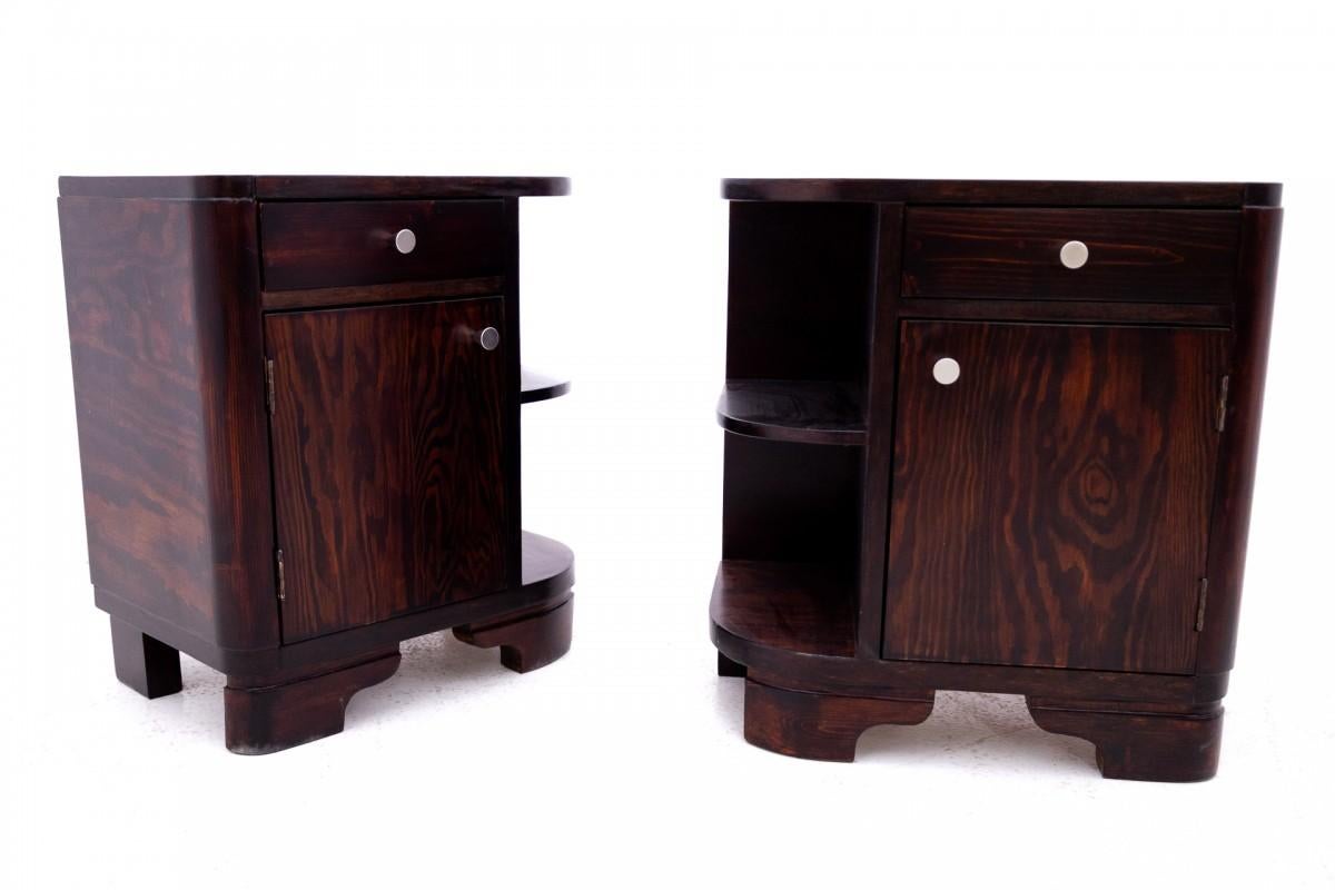 Art Deco bedside tables from the mid-20th century, Poland.

Furniture in very good condition, after professional renovation.

Dimensions: height 61 cm / width 55 cm / depth 36 cm