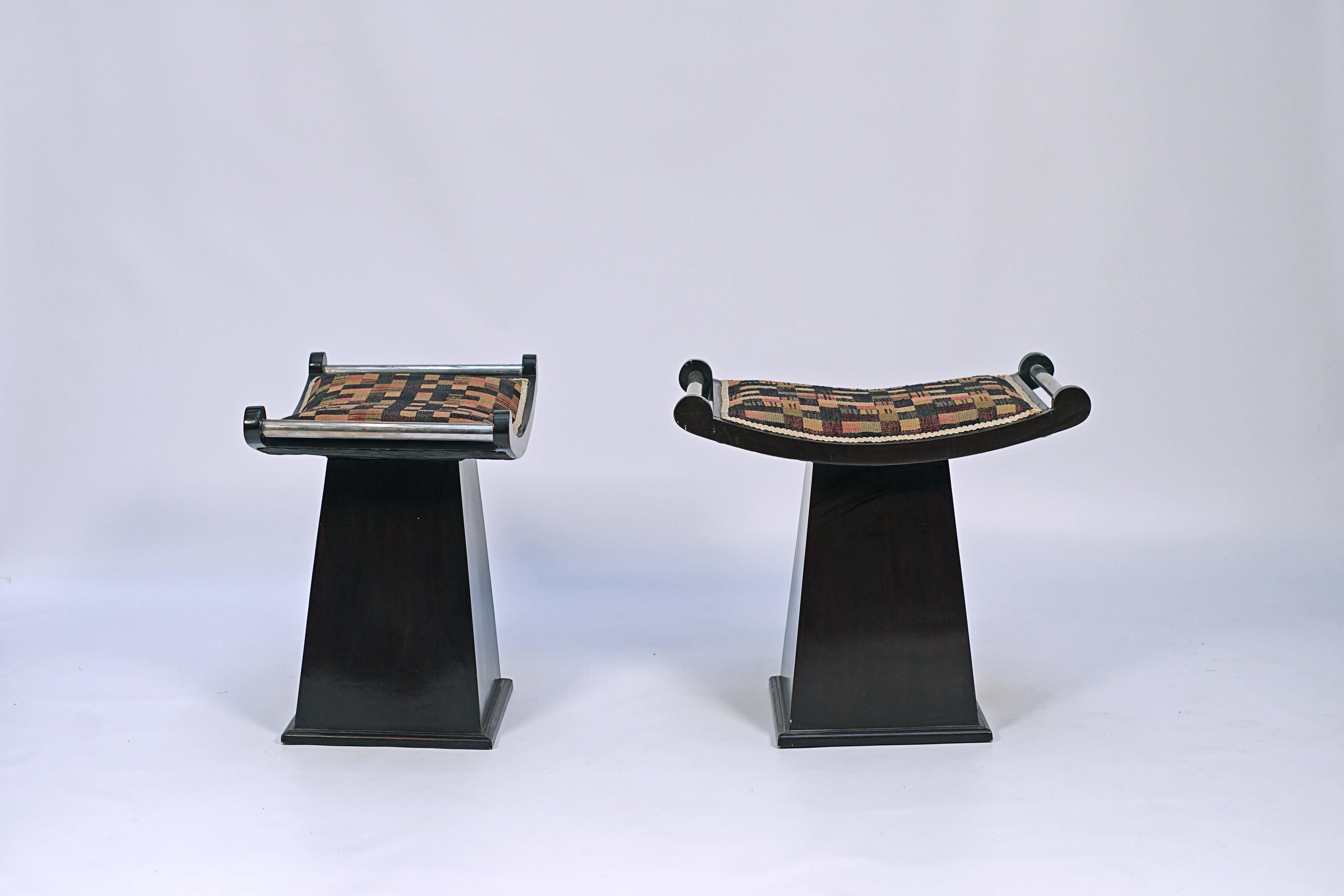 Pair of Art Deco T-shaped benchs. Wooden black gloss finish and metal bars at the sides.

France, CIRCA 1930.