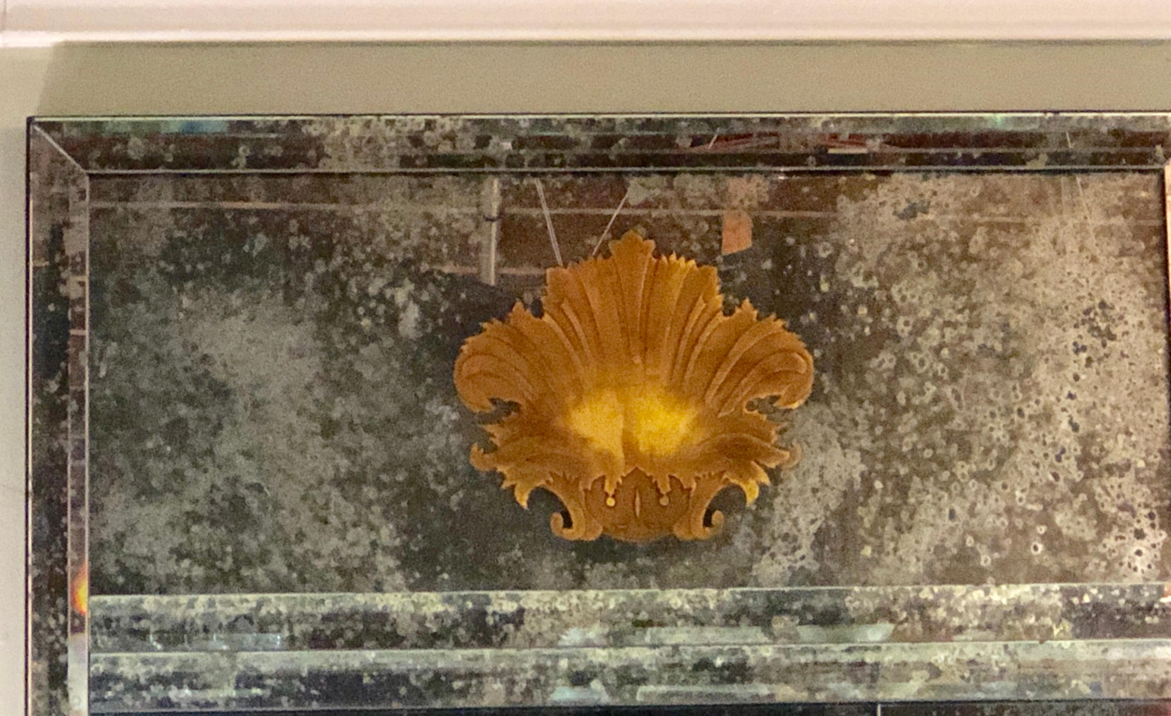 Glass Pair of Art Deco Beveled Console or Wall Mirrors with Engraved Gilt Shell Motif