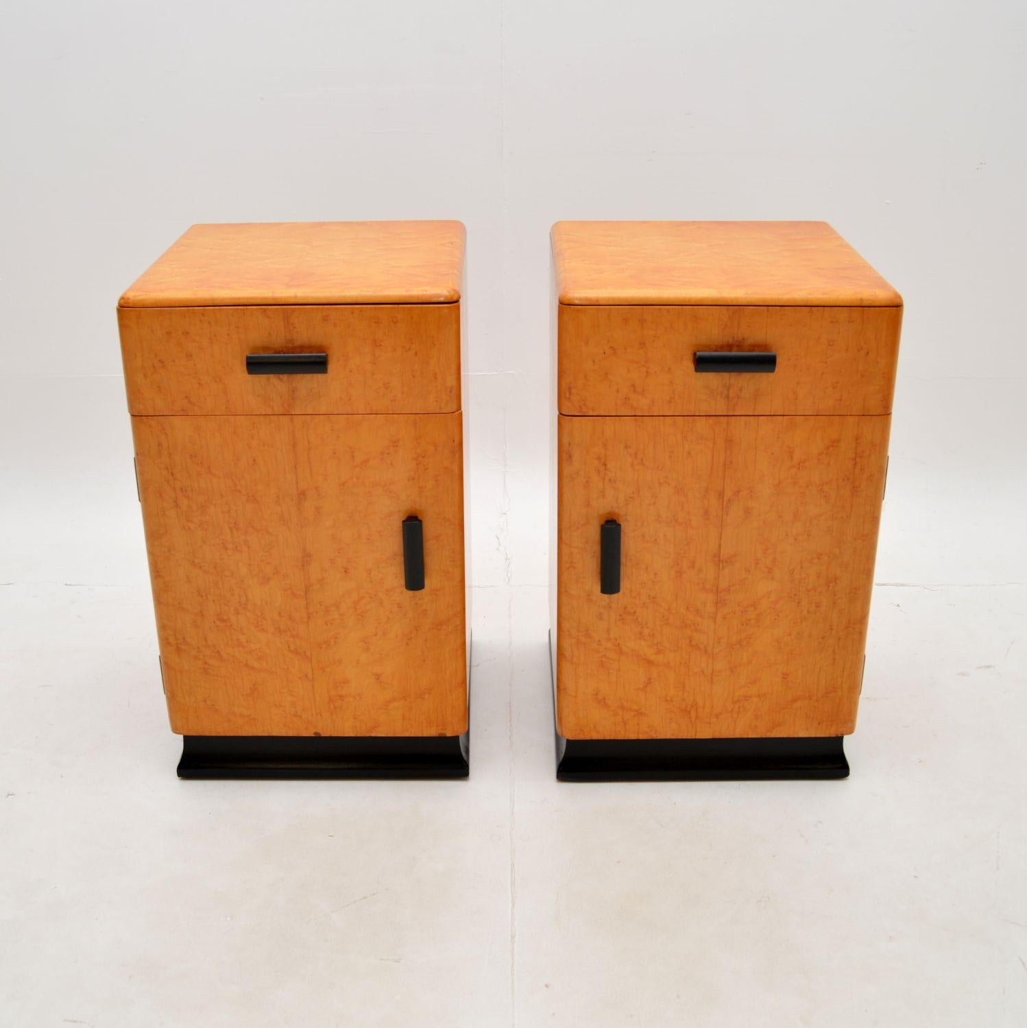 A beautiful pair of Art Deco birds eye maple bedside cabinets. They were made in England, they date from around the 1930’s.

These are very well made and are a useful size, offering lots of storage space in the cabinet and drawers. They sit on