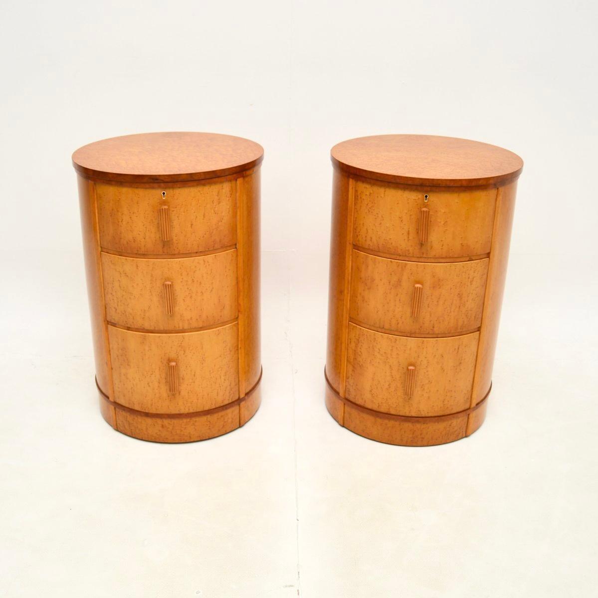 A beautiful and rare pair of Art deco birds eye maple bedside chests, made in England and dating from the 1930’s.

It is unusual to find this cylindrical design, they are of amazing quality and have great proportions. They would be equally useful as