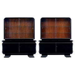 Pair of art deco black lacquered glazed display cabinets