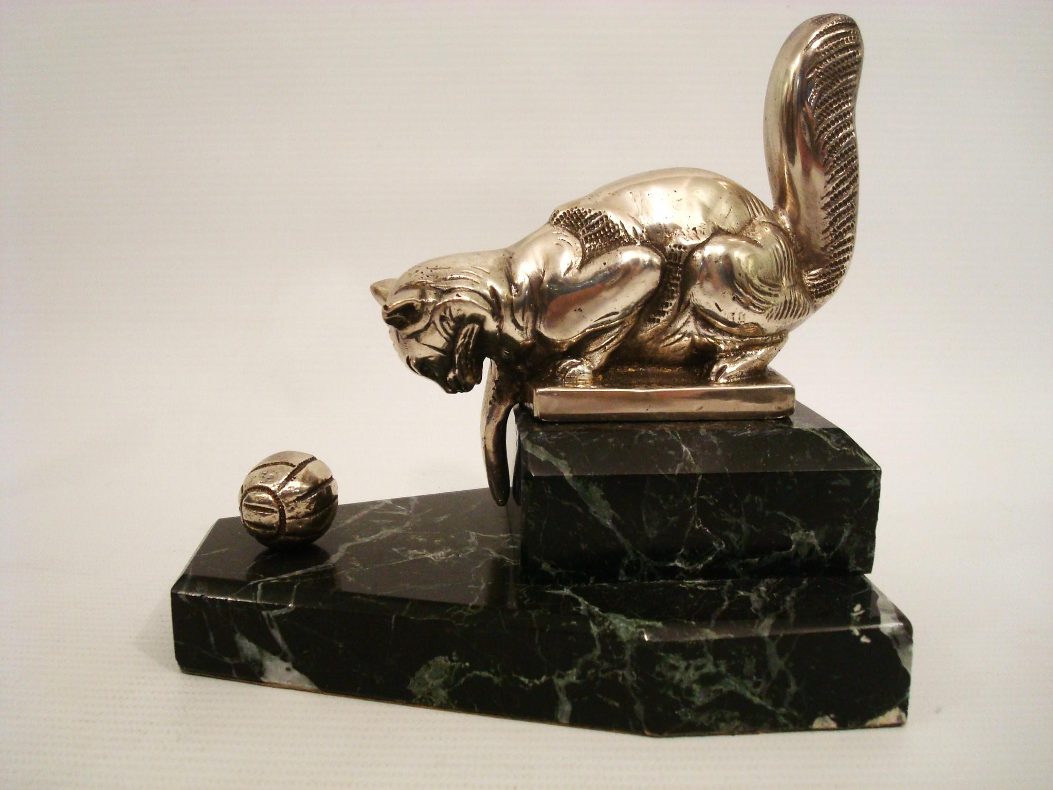 Silvered Pair of art deco bookends Cat playing with a Ball. France 1925 For Sale