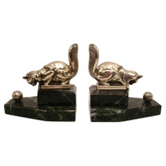 Pair of art deco bookends Cat playing with a Ball. France 1925
