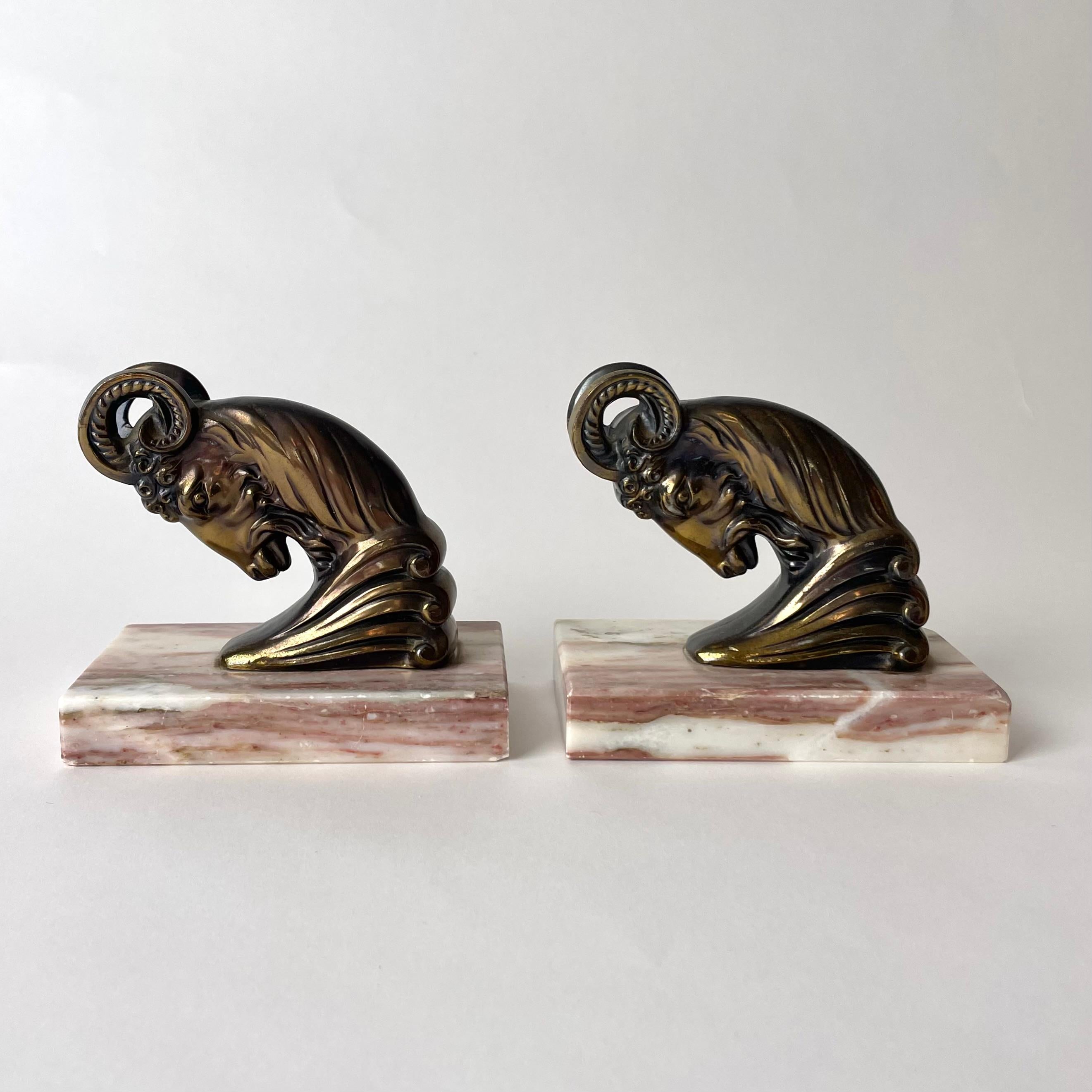 French Pair of Art Deco Bookends from the 1930s with very period and powerful rams. For Sale