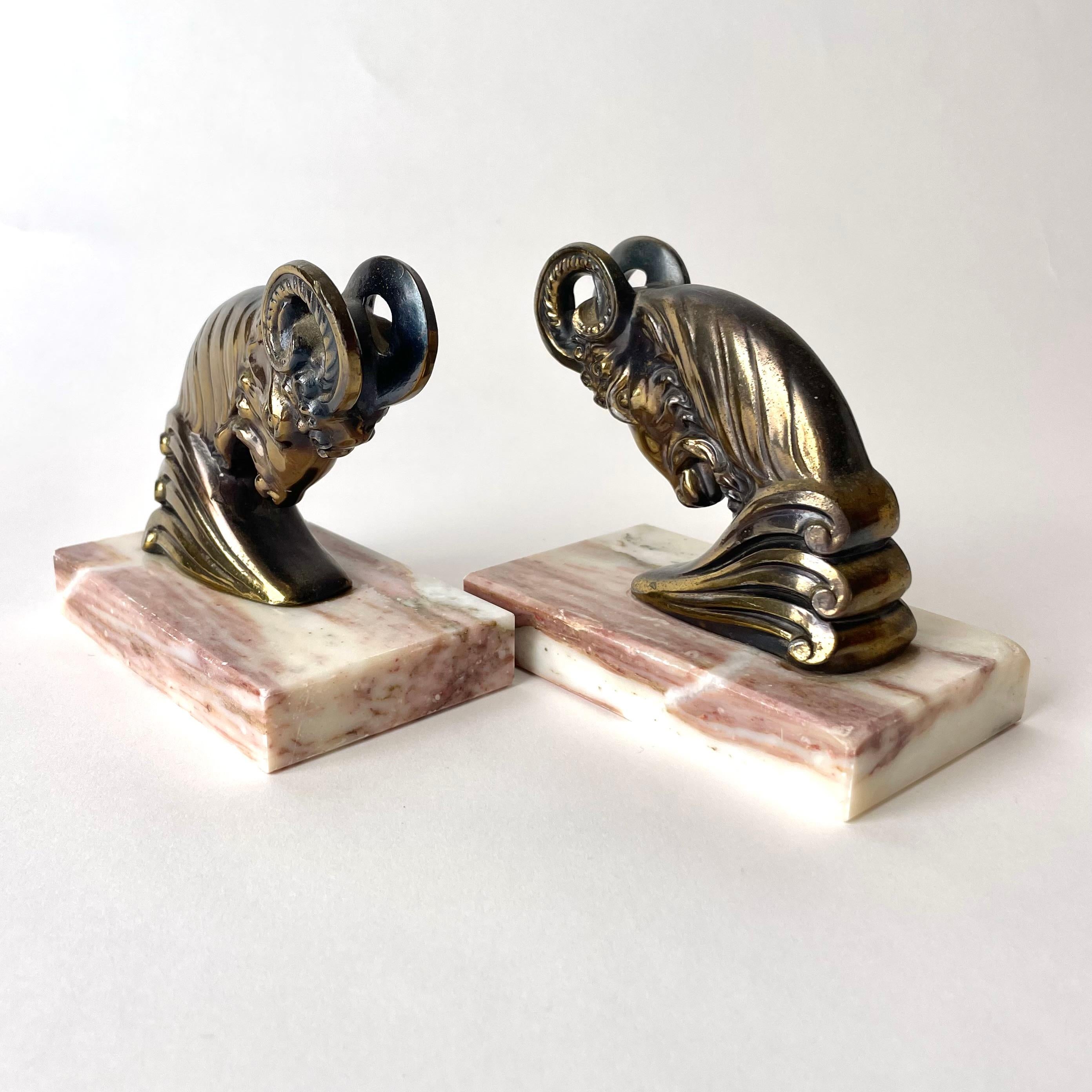 Mid-20th Century Pair of Art Deco Bookends from the 1930s with very period and powerful rams. For Sale