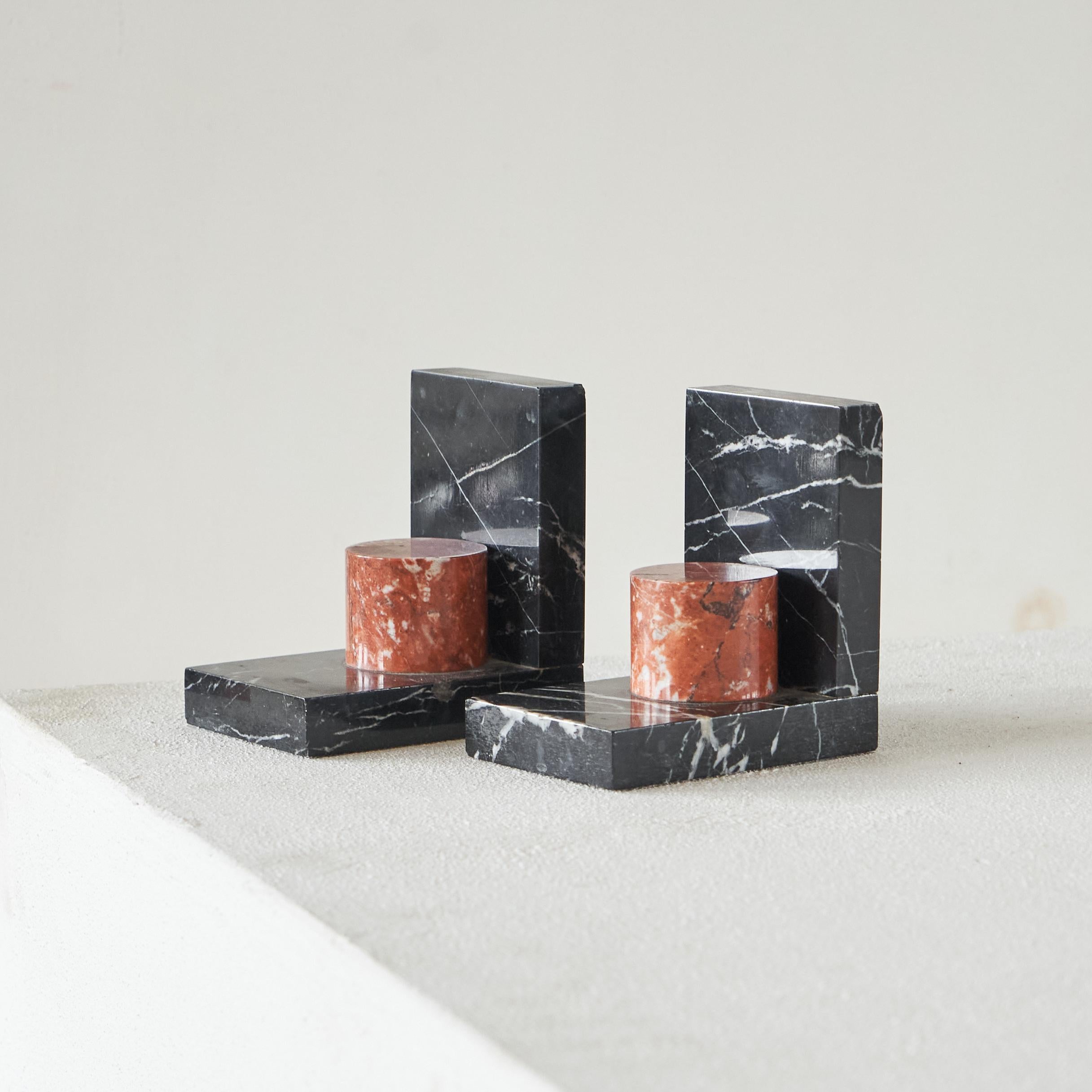 Pair of Art Deco Bookends in Marble, Europe, 1940s.

This is a beautiful pair of bookends in a very distinct art deco style. Wonderful and elegant, these will hold your books in a very stylish way. 

The pair comes in a good vintage condition with