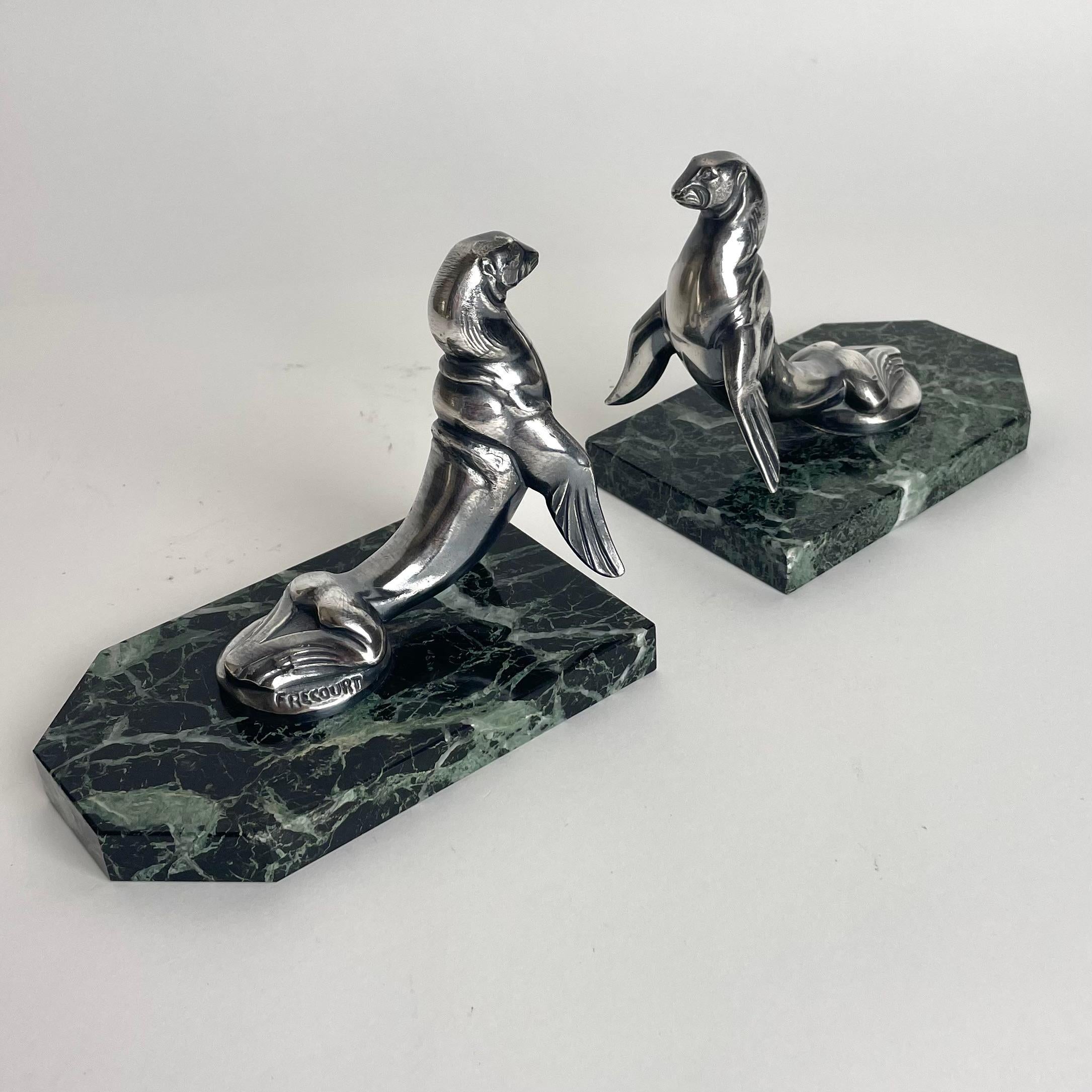 Silver Plate Pair of Art Deco bookends of Sea Lions by Maurice Frecourt. From the 1920s For Sale