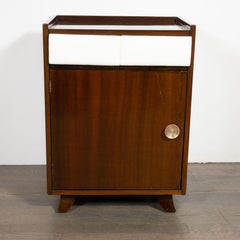 Pair of Art Deco Bookmatched Mahogany and Leather Nightstands by Gilbert Rohde