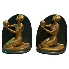 Antique Pair of Art Deco Brass and Metal Nude Woman with Sphere Figurative Bookends