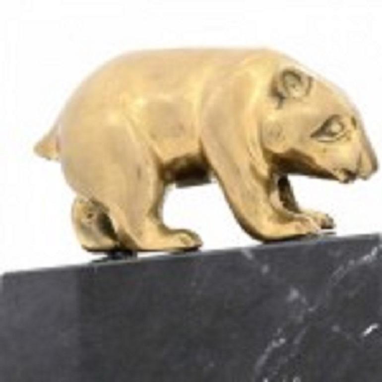 Paire de serre-livres Art Déco américains avec un taureau et un ours en laiton montés sur un socle noir (PRIX PAR Paire)
