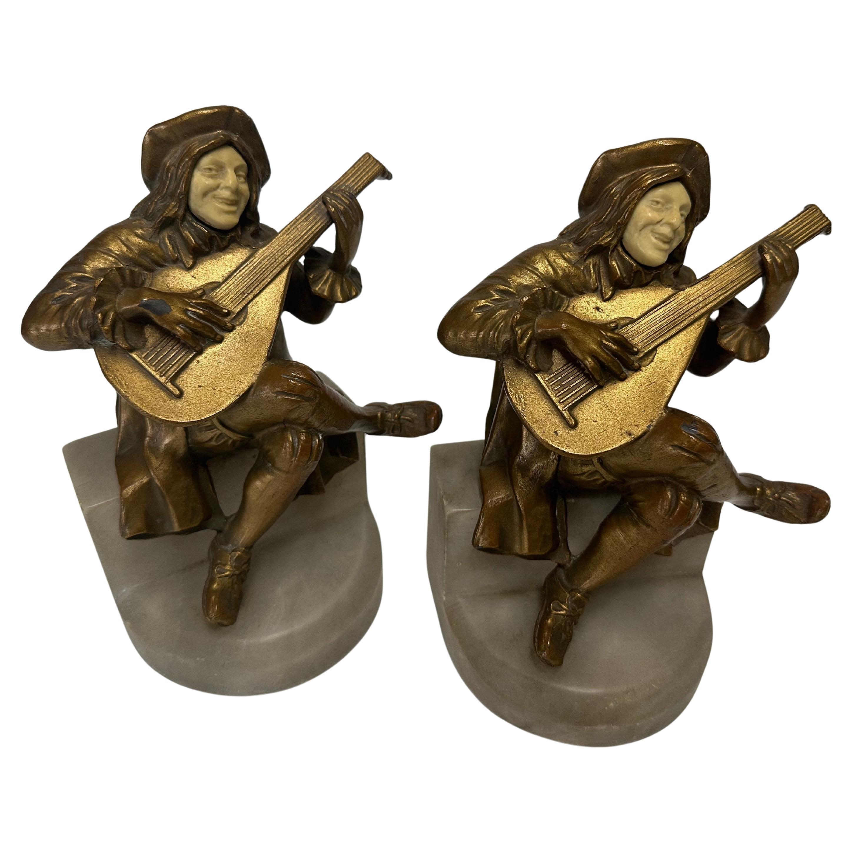 Art Déco Pair of Art Deco Brass Minstrel Bookends on Marble Attributed to DAV ART NY in vendita
