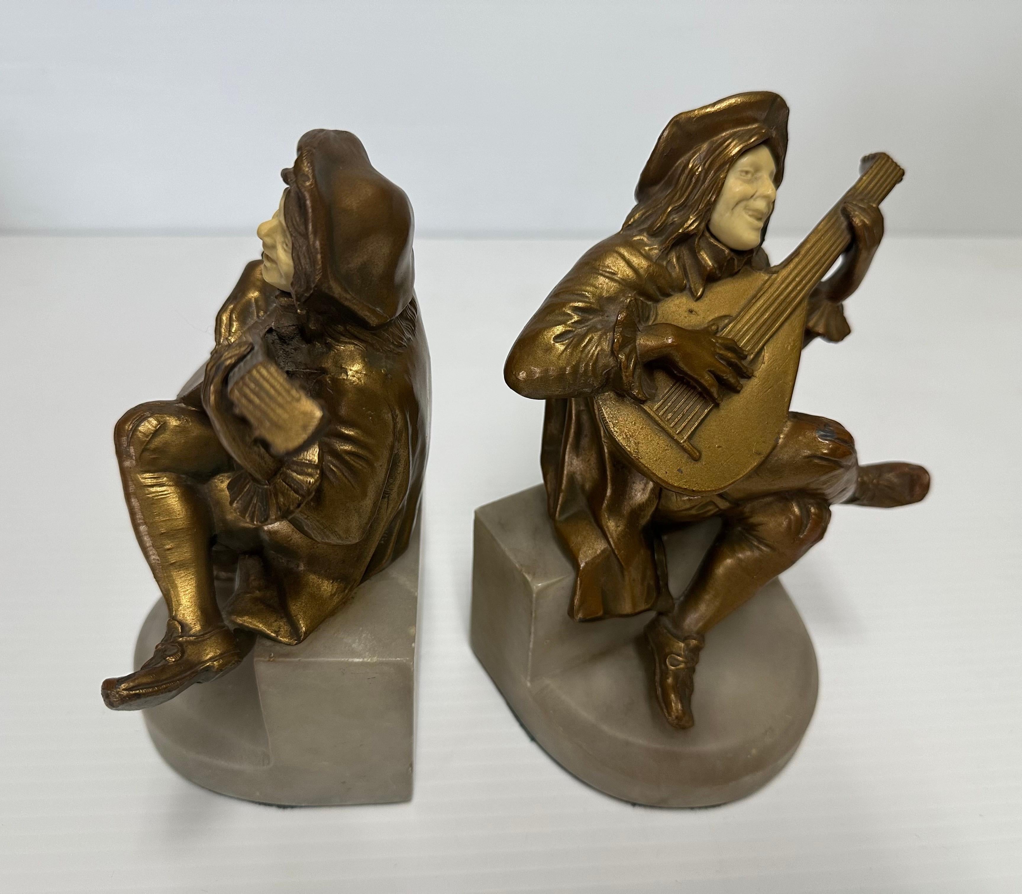 Pair of Art Deco Brass Minstrel Bookends on Marble Attributed to DAV ART NY in vendita 1