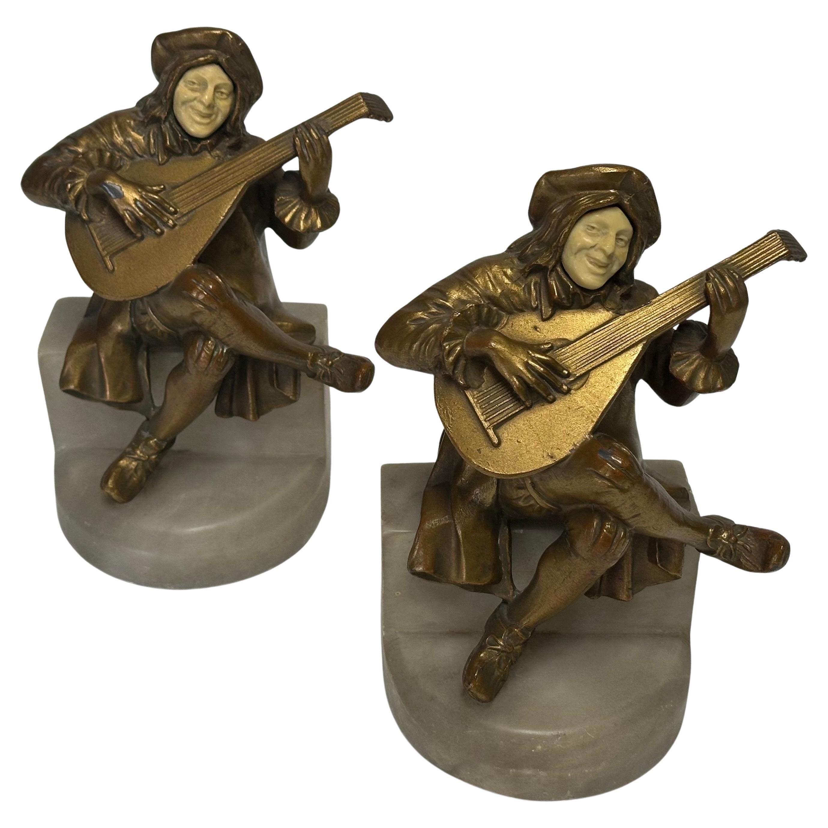 Pair of Art Deco Brass Minstrel Bookends on Marble Attributed to DAV ART NY