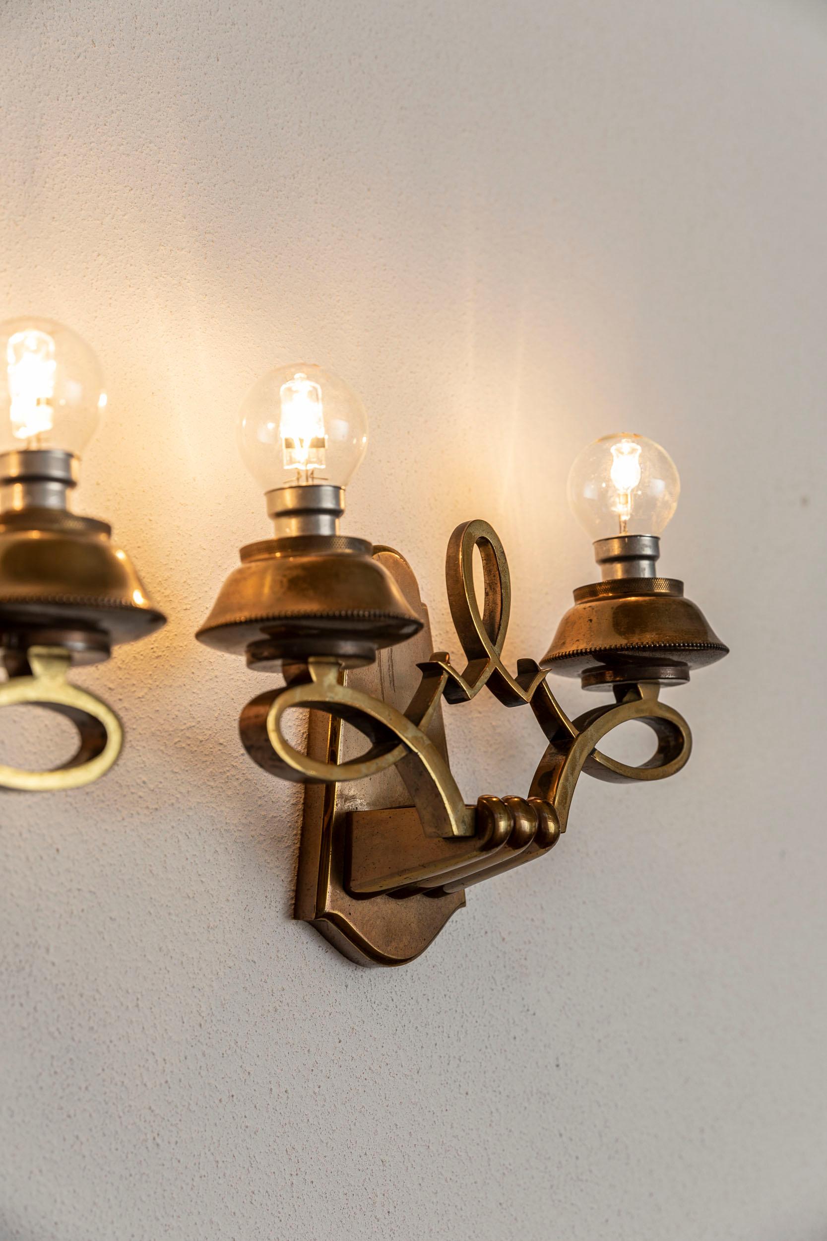 French Pair of brass sconces, Jules Leleu style For Sale