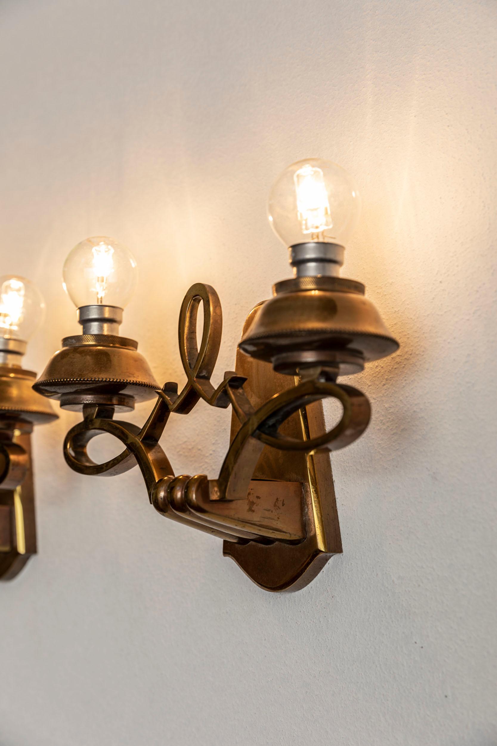 Mid-20th Century Pair of brass sconces, Jules Leleu style For Sale