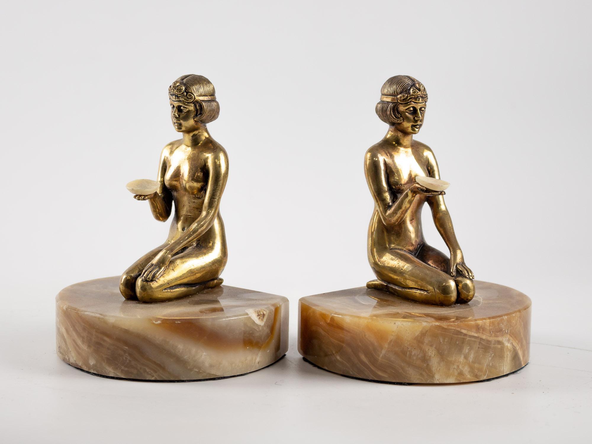 A pair of Art Deco bookends by Armand Godard, circa 1935. 
It is signed “Godard” on the back of one base.
Bowls are made on ivoirine.


We enclose a certificate of authenticity issued by the expert in the 20th century of our gallery.
 