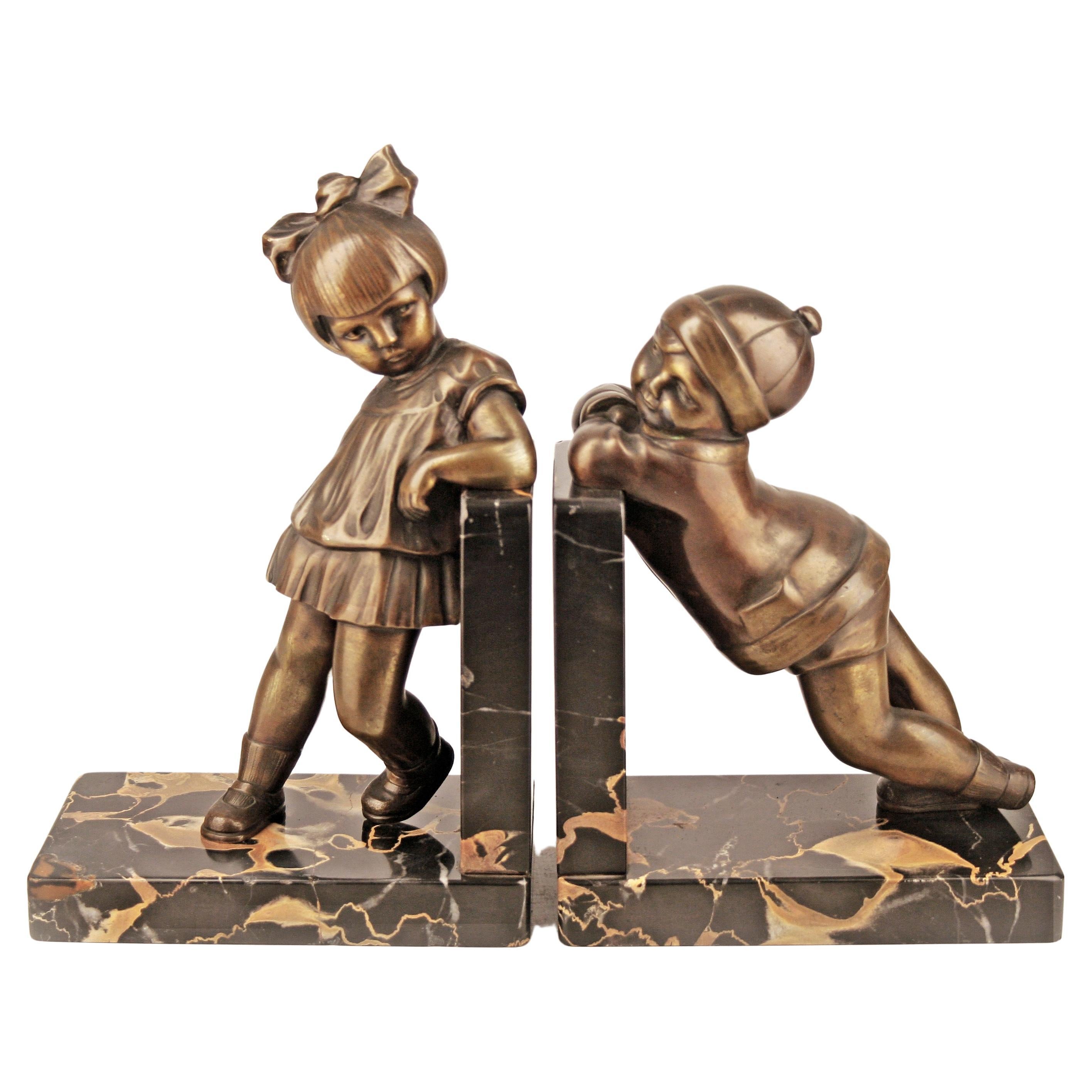 Pair of Art Déco Bronze Bookends Designed by Alexandre Kéléty for Etling Paris For Sale