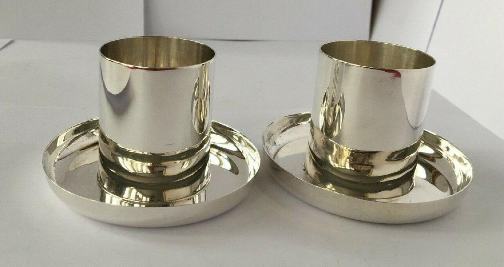 Pair of Art Deco Sterling Silver Candle Holders

In good condition, they are a classic and stylish design. These are solidly constructed, and the large size can easily accommodate candles of various widths. The maker’s name is rubbed off. Made in