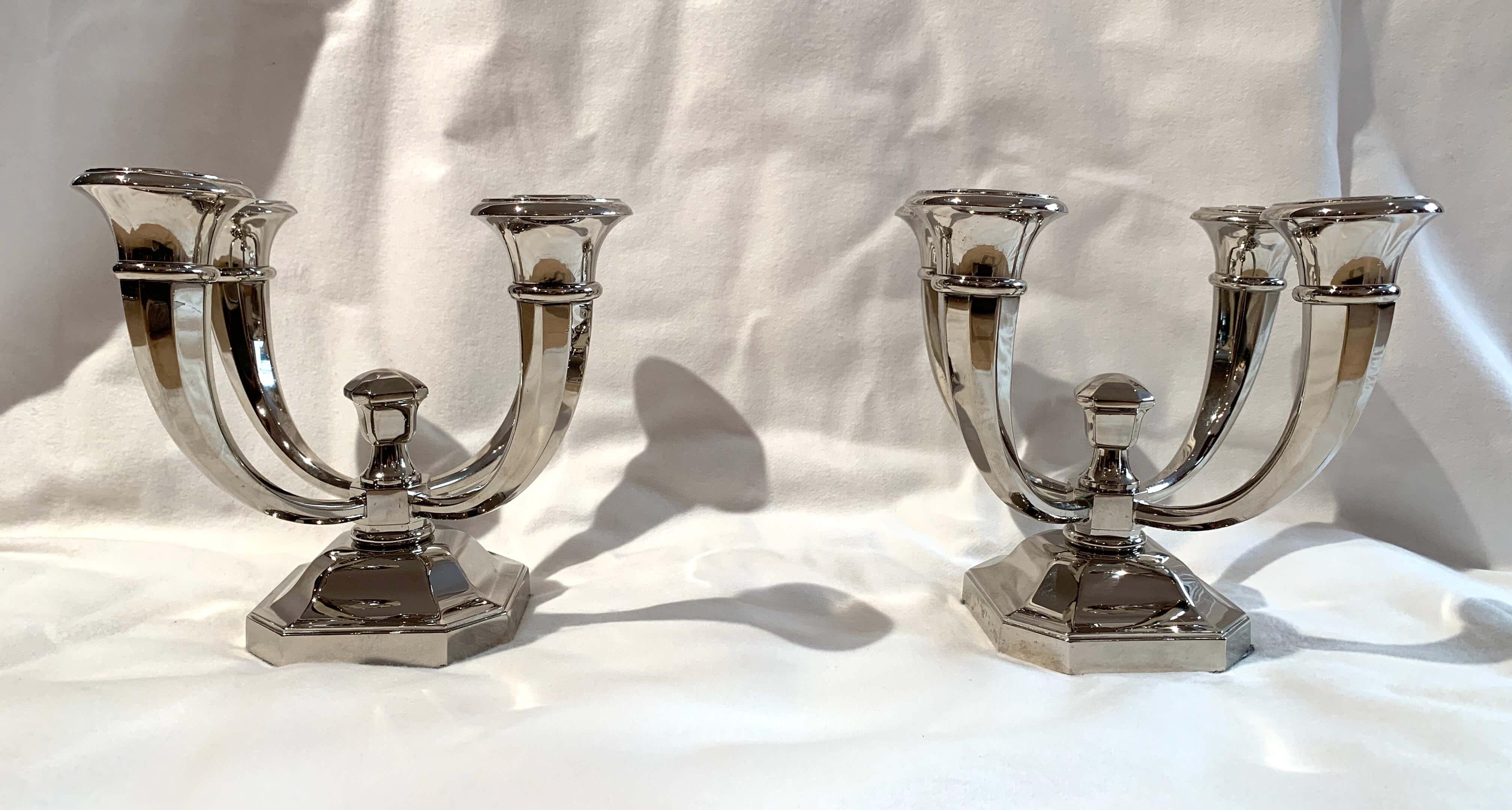 Pair of Art Deco candlesticks by J. Leleu, nickel on bronze, France, circa 1930.

Very fine and elegant pair of four-armed Art Deco candlesticks / candleholders / candelabras by Jules Leleu (1883 - 1961).
Excellent quality, heavy cast bronze (6,5