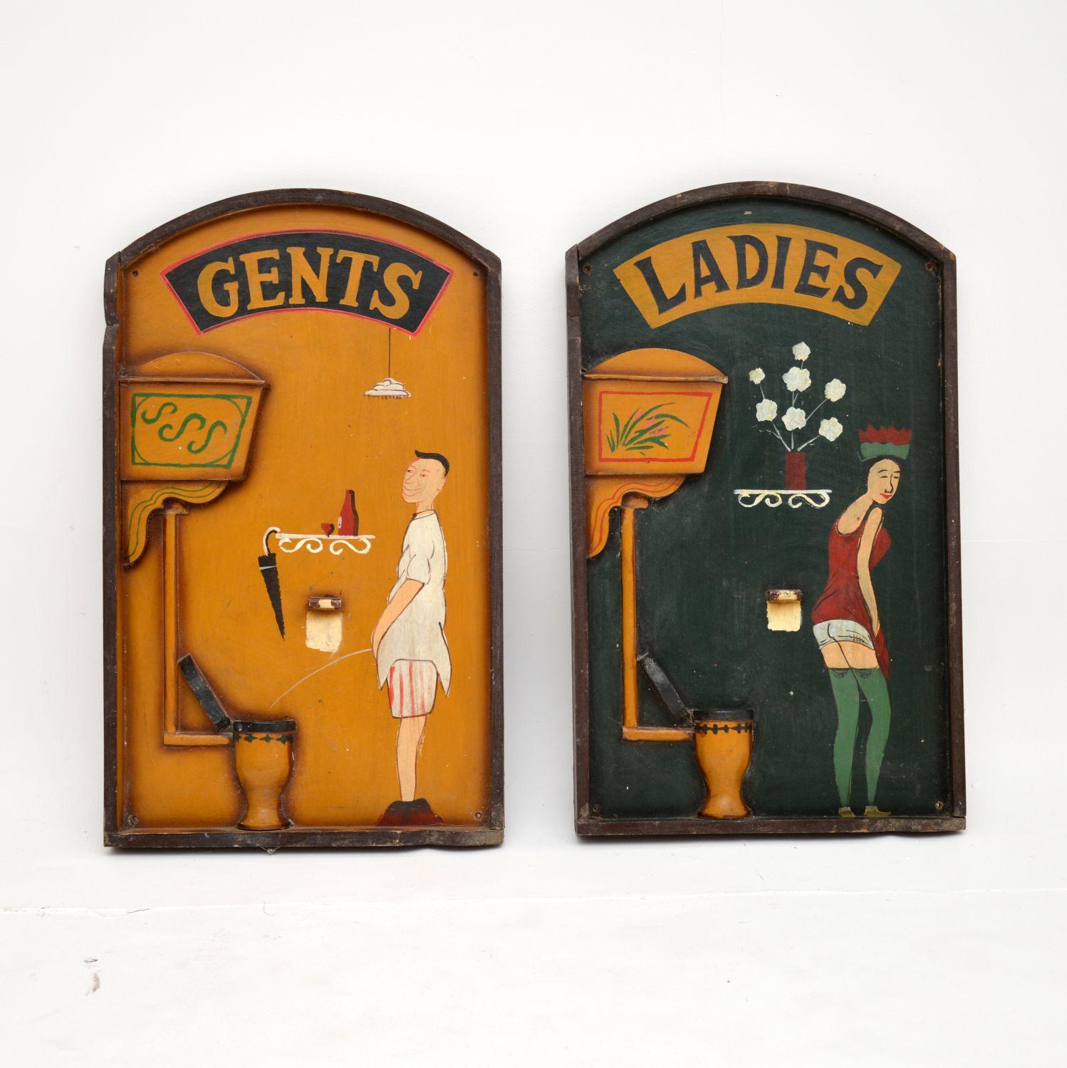 A humorous and very unusual pair of his and hers Art Deco toilet signs. These were made in England and date from around the 1930’s.

They are carved and painted, with the toilets and loo roll holders protruding as reliefs. They are full of