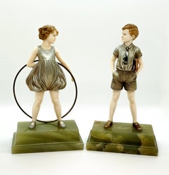 Pair of Art Deco Child Figurines 'Hoop Girl' & 'Sunny Boy' by Ferdinand Preiss