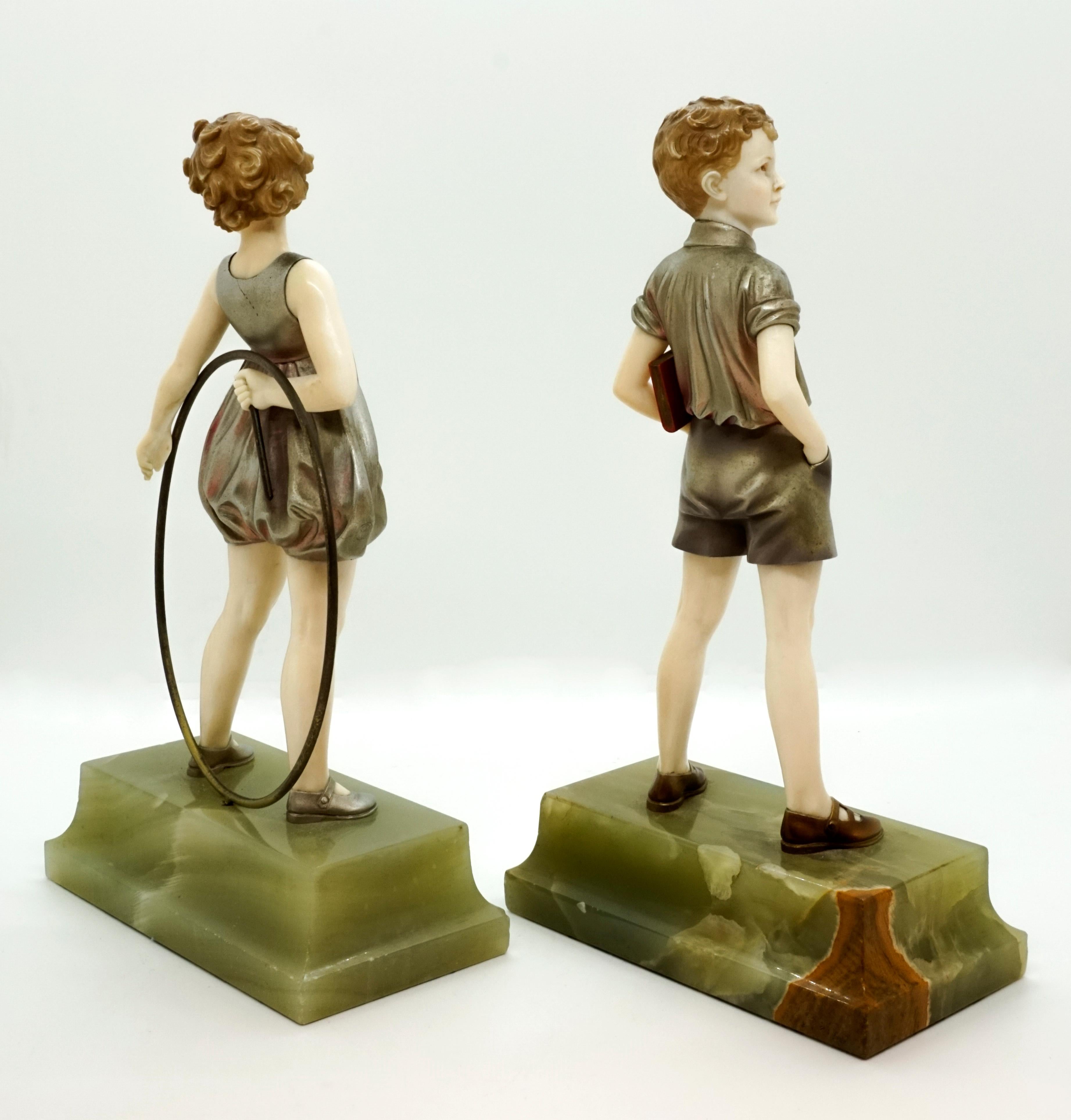 Pair of Art Deco Child Figurines 'Hoop Girl' & 'Sunny Boy' by Ferdinand Preiss In Good Condition In Vienna, AT