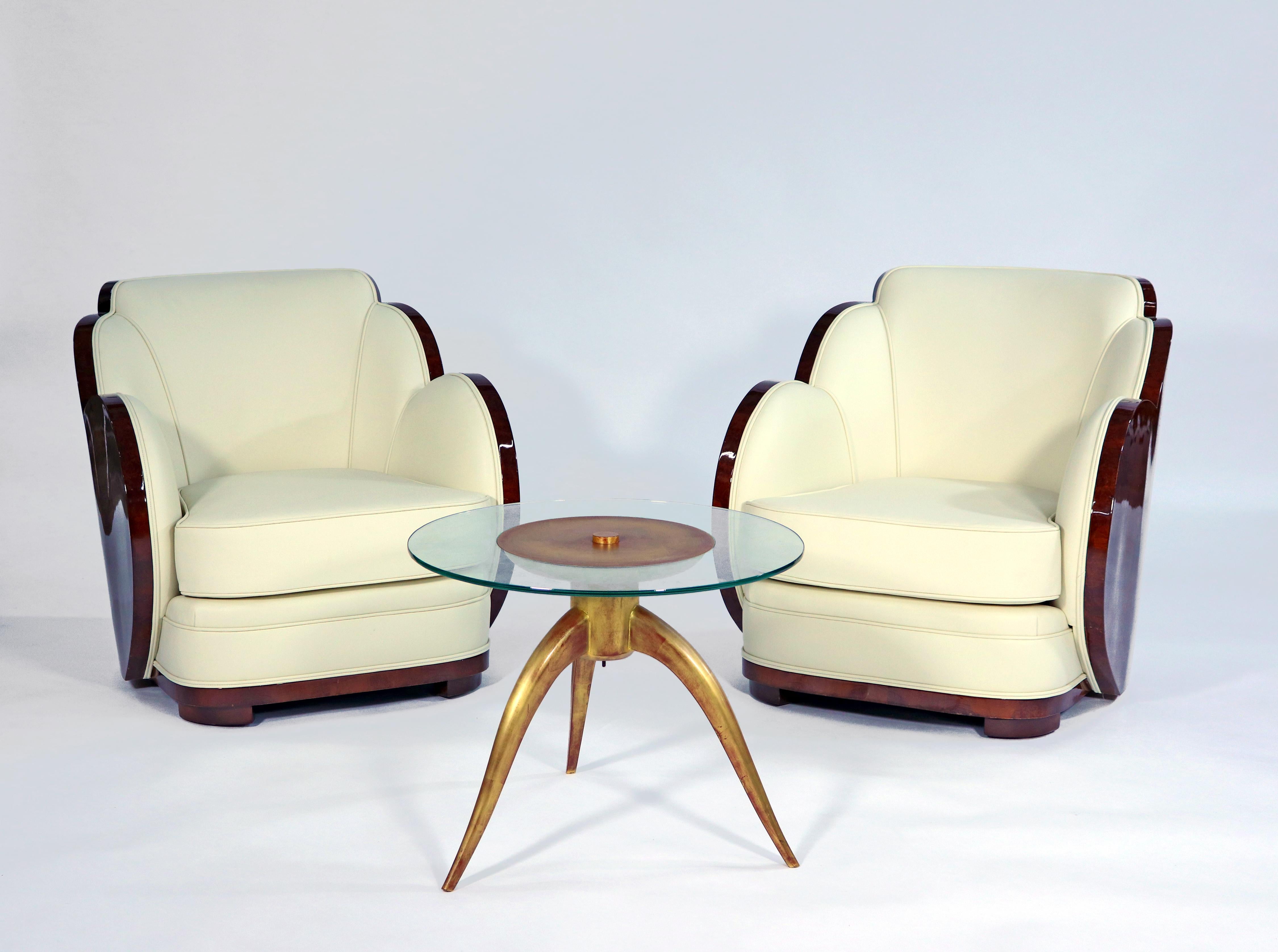 Pair of Art Deco cloud club chairs. The cloud theme was a feature of Epstein brother’s furniture including lounge suites, salon chairs, dining suites and cocktail cabinets. Highly sought after. The quality of the furniture produced by the Epstein