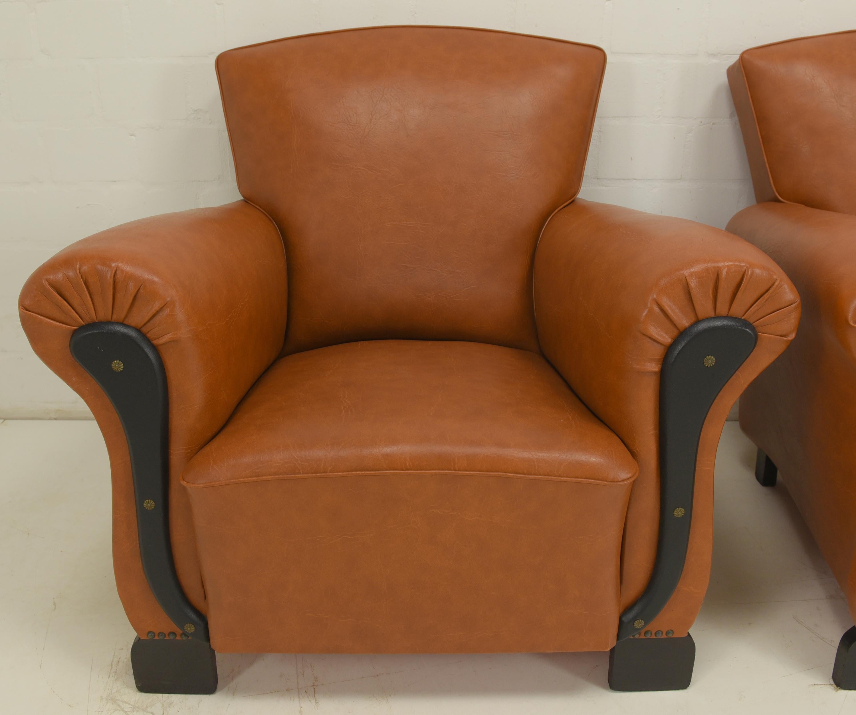 Pair of club armchairs Art Déco around 1940 Lounge chairs imitation leather armchairs two 2

Features:
Minor damage on the armrests (small holes)
Stylish art deco design
Very rare as a pair in such good condition

Additional