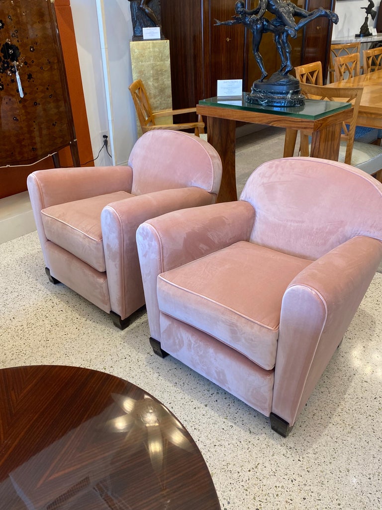 Art Deco pair of club chair by the french designer Jules Leleu made out of a solid Mahogany frame and Rosé color velvet upholstery and rosewood legs.
Made in France 
Circa: 1945
Reference: House of Leleu by Francoise Siriex, Page 73.