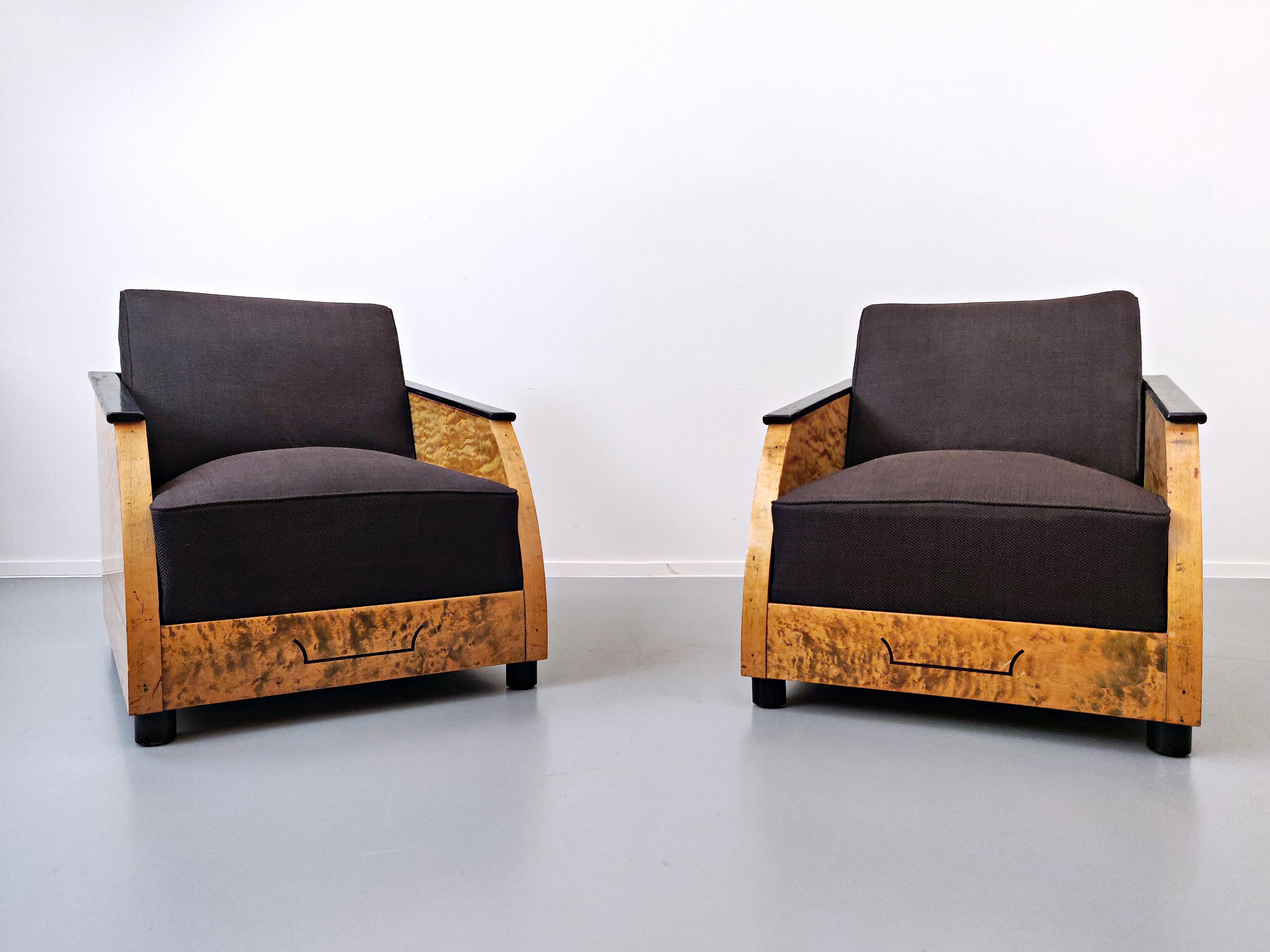 Pair of Art Deco club chairs in polished burr wood.