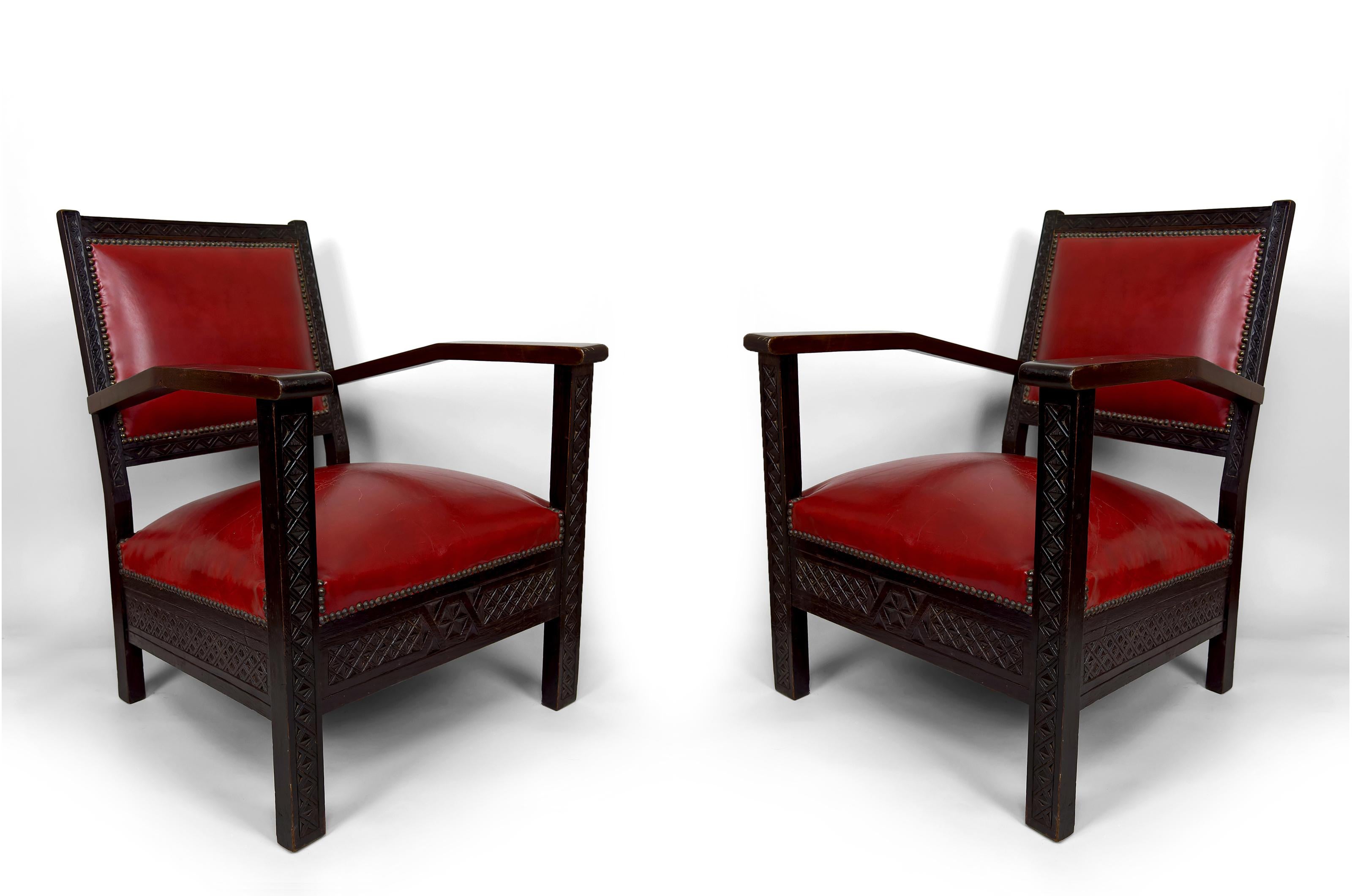 Pair of Art Deco Colonial Armchairs in Carved Wood, French Algeria, Circa 1930

We are delighted to present this elegant pair of Art Deco Colonial armchairs, crafted from carved wood and decorated with Berber motifs. 

These remarkable pieces,