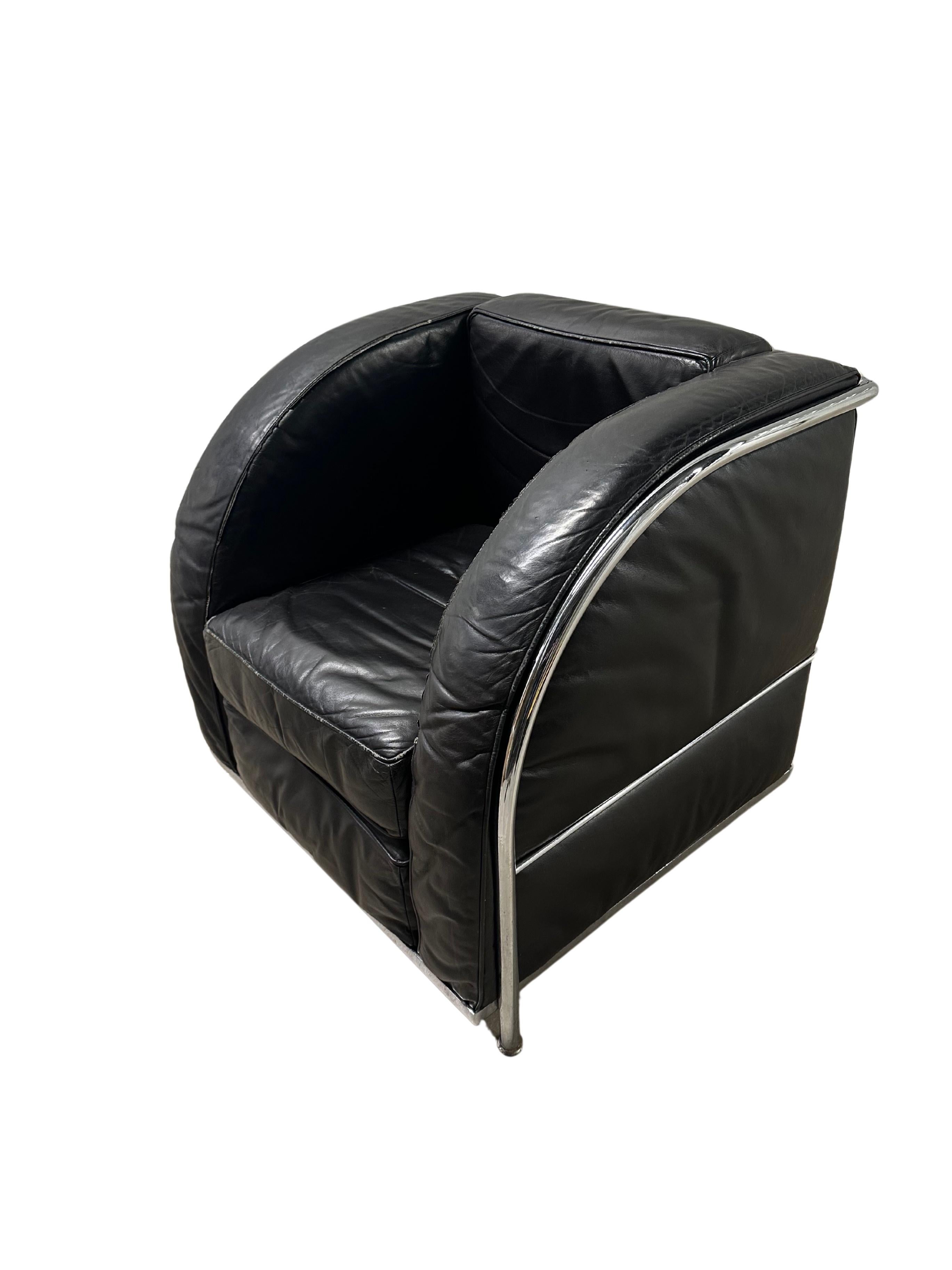 Pair of Corbusier Style Chrome and Leather Club Chairs (sold as a pair)

A striking pair of late 20th-century black leather and chrome frame club chairs, crafted in homage to the iconic LC2/LC3 Grand Confort chairs by Le Corbusier, Pierre Jeanneret,