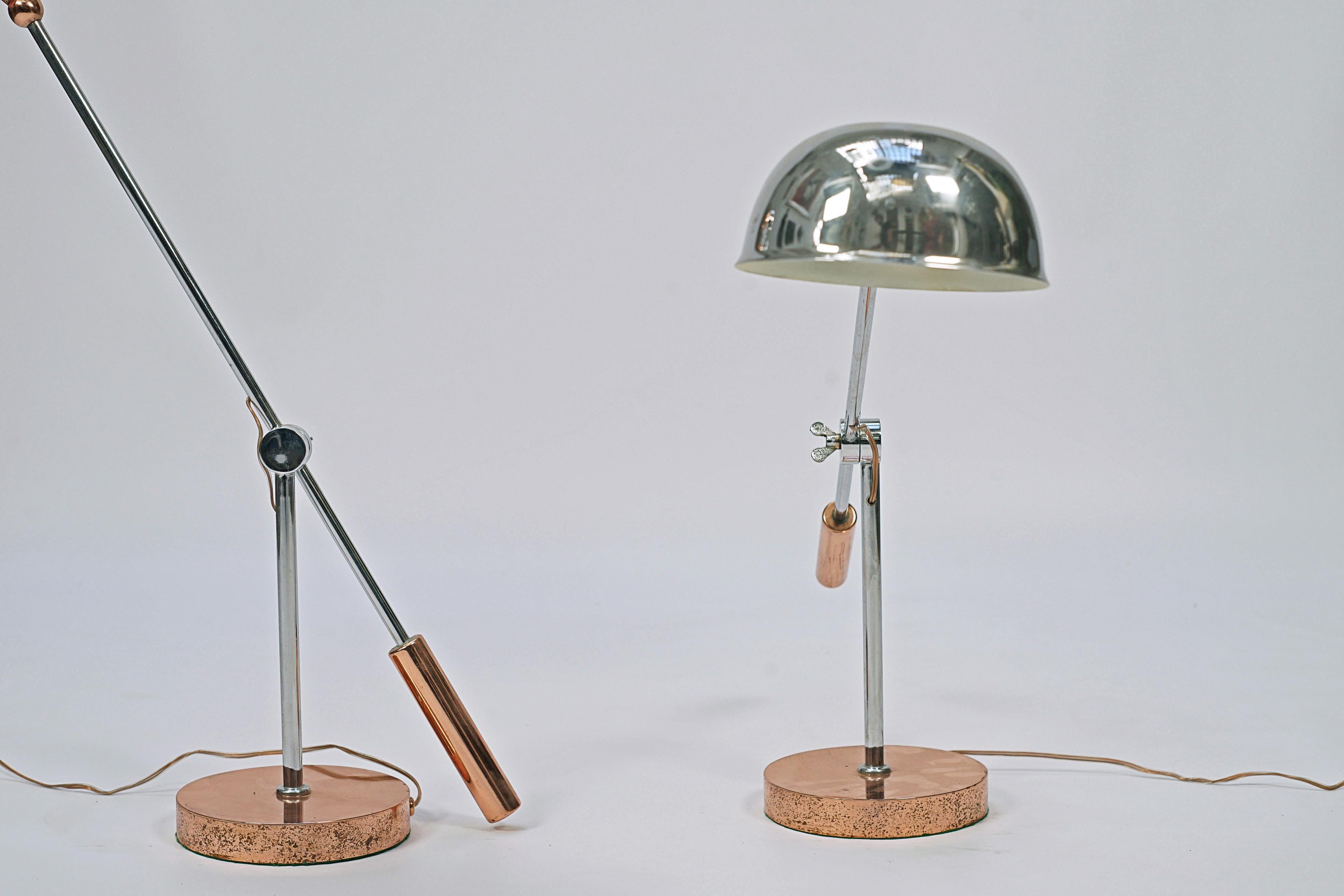 Pair of Art Deco desk lamps. Chromed bronze and details in copper.

Europe, circa 1940.