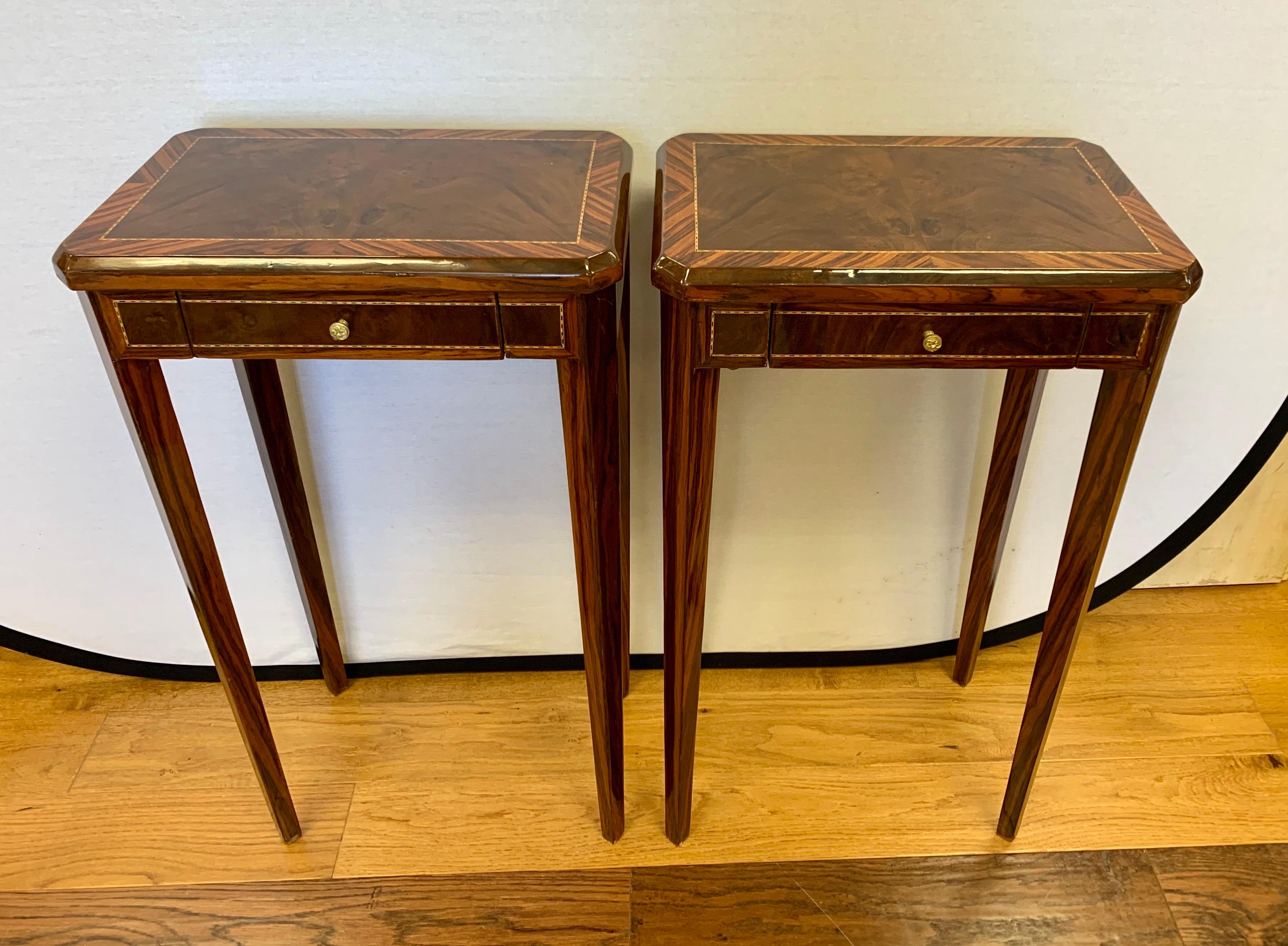 Gorgeous pair of Art Deco style end tables with great scale and better lines. Imported from Italy in the 1960s. Great condition and gorgeous, subtle inlay.