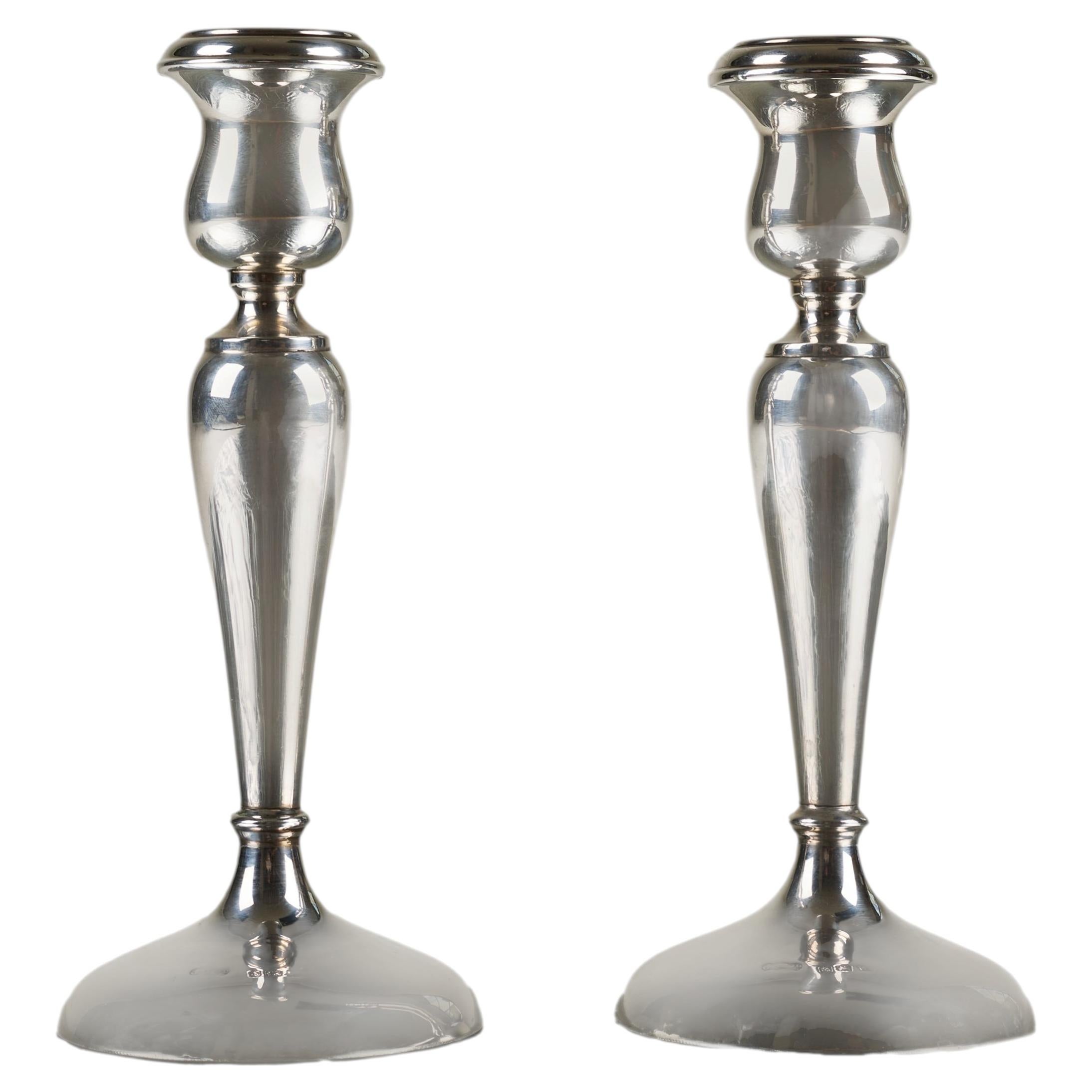 How much are sterling silver candlesticks worth?